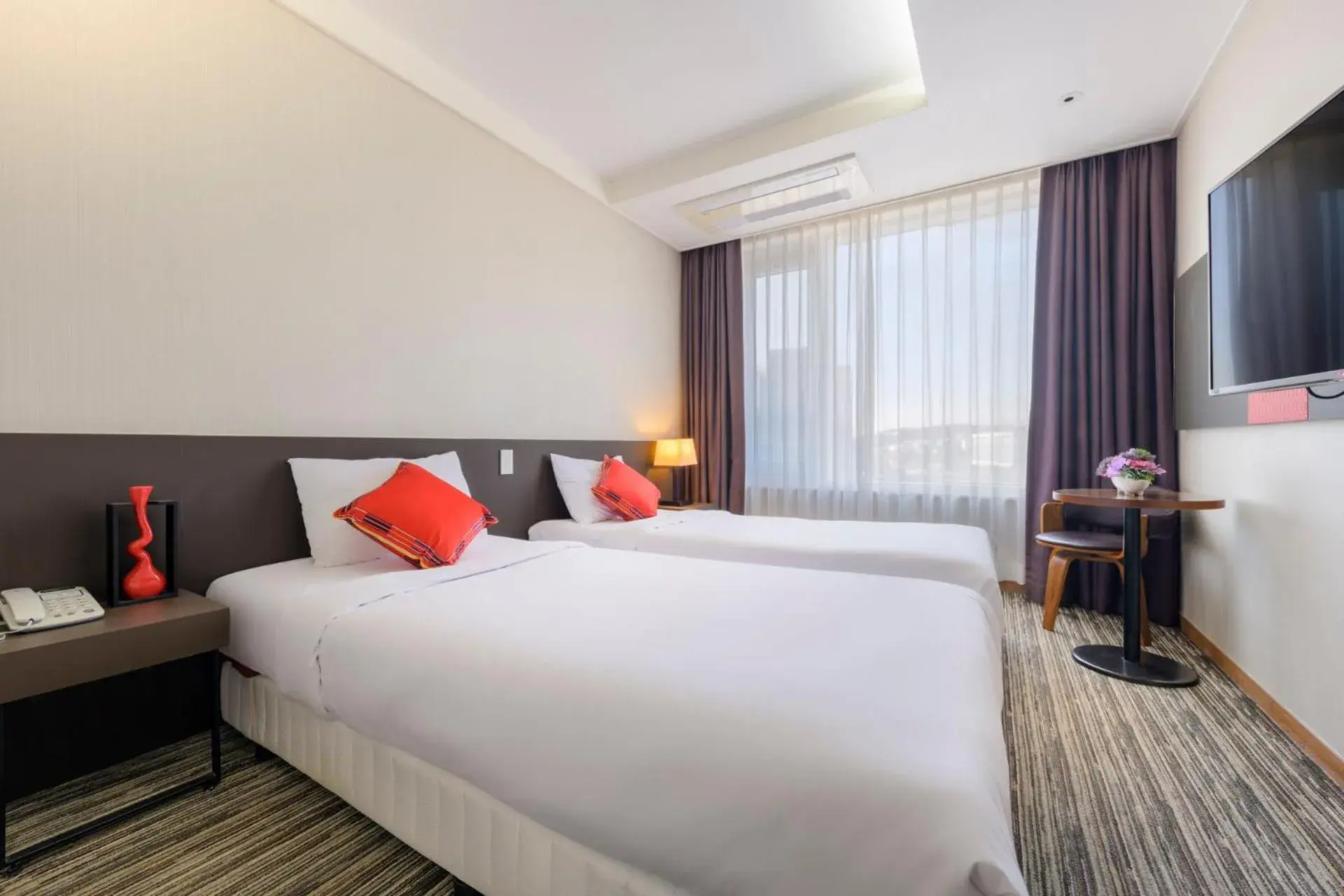 Bed in Shin Shin Hotel Jeju Worldcup Bed in Shin Shin Hotel Jeju Worldcup