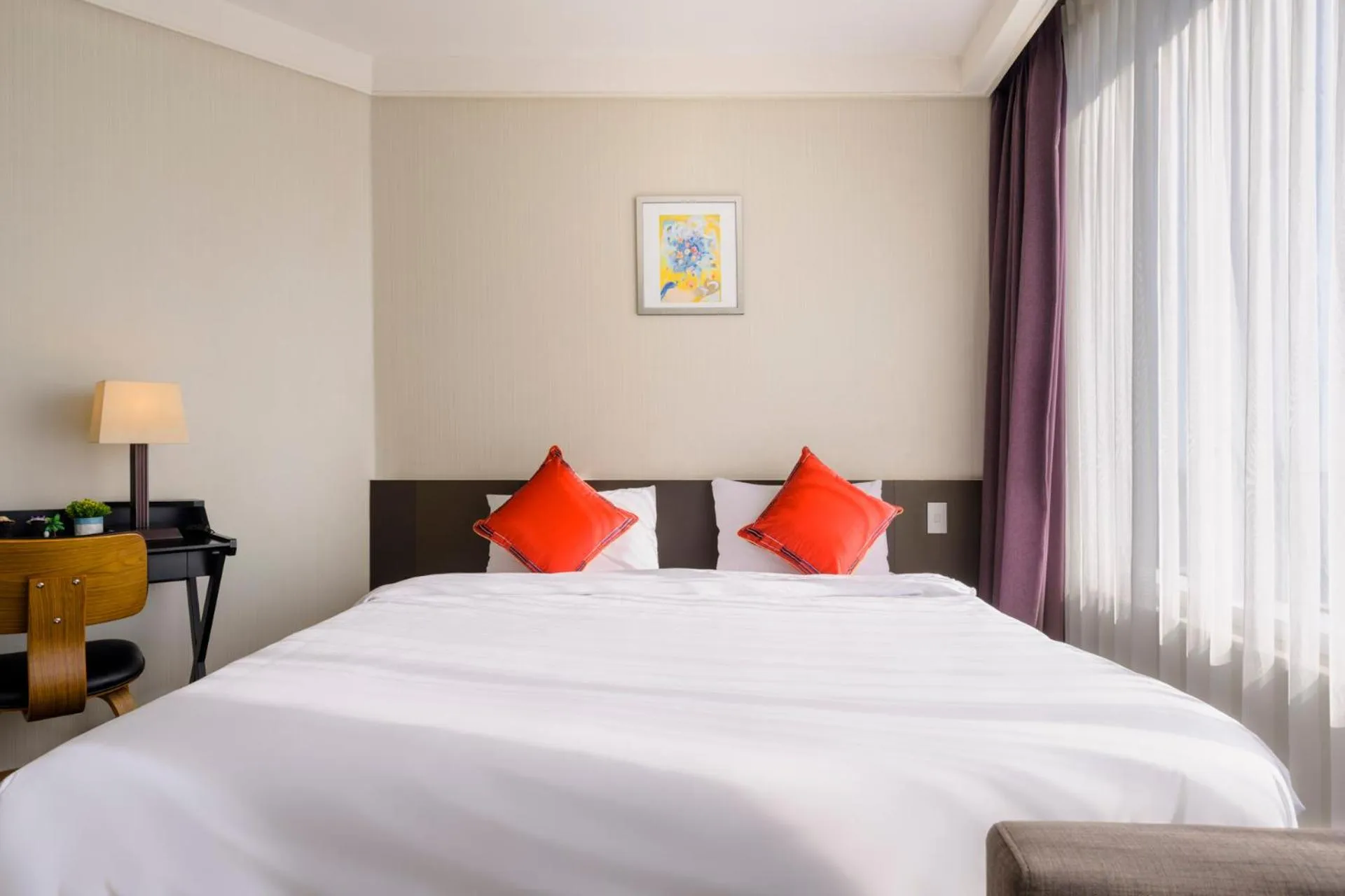 Bed in Shin Shin Hotel Jeju Worldcup