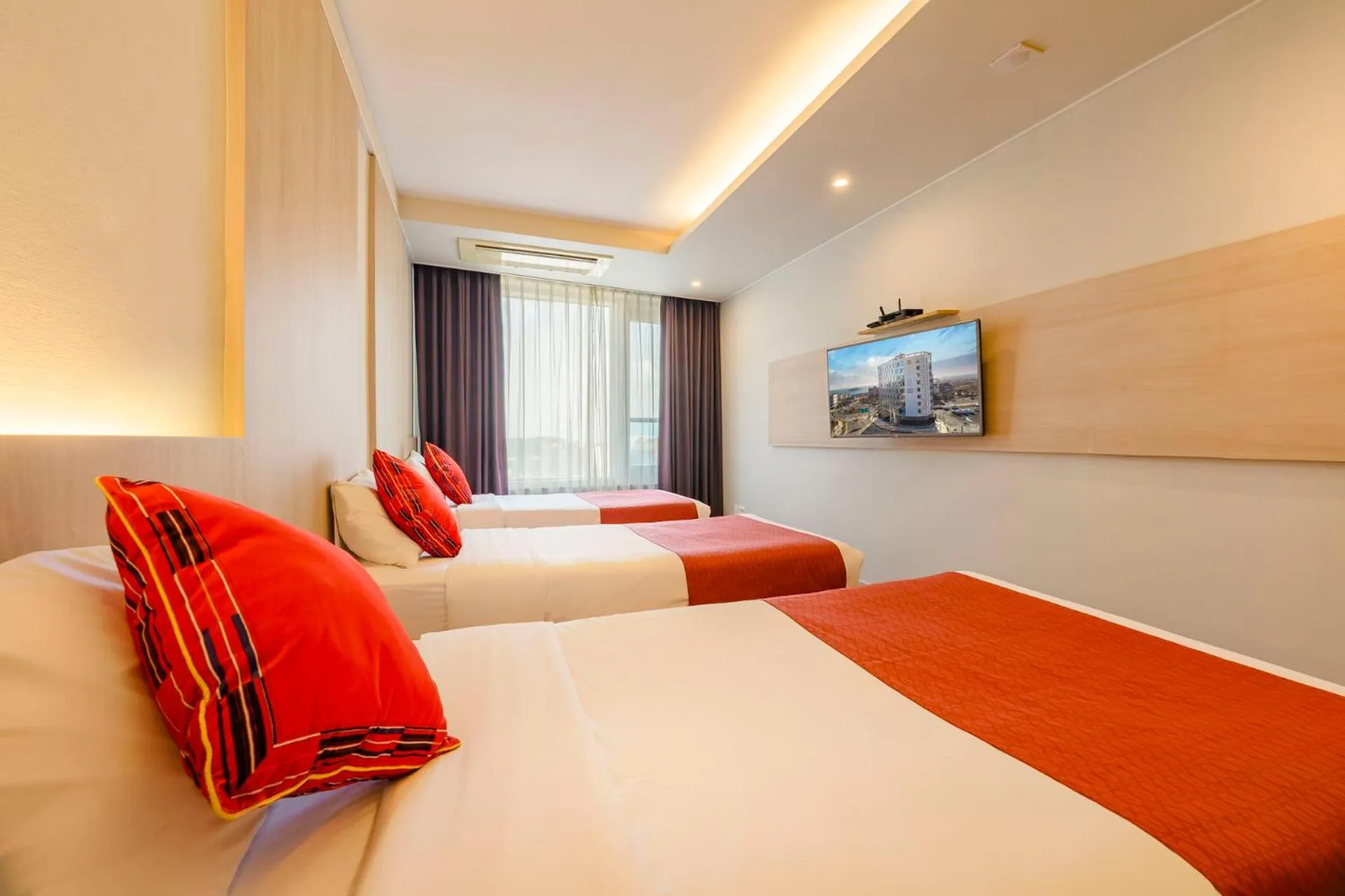 Bed in Shin Shin Hotel Jeju Worldcup