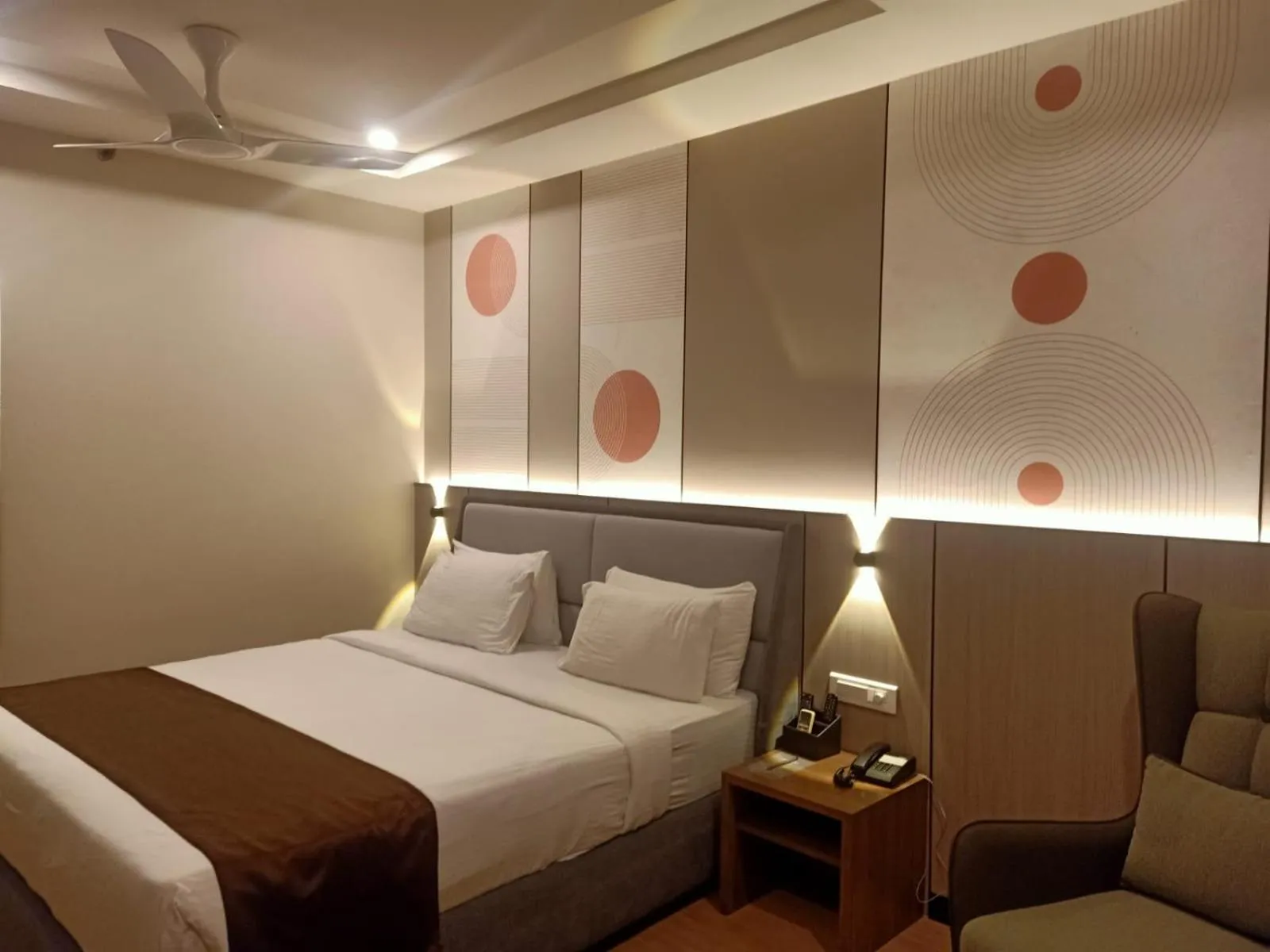 Bed in Pramod Convention & Beach Resorts