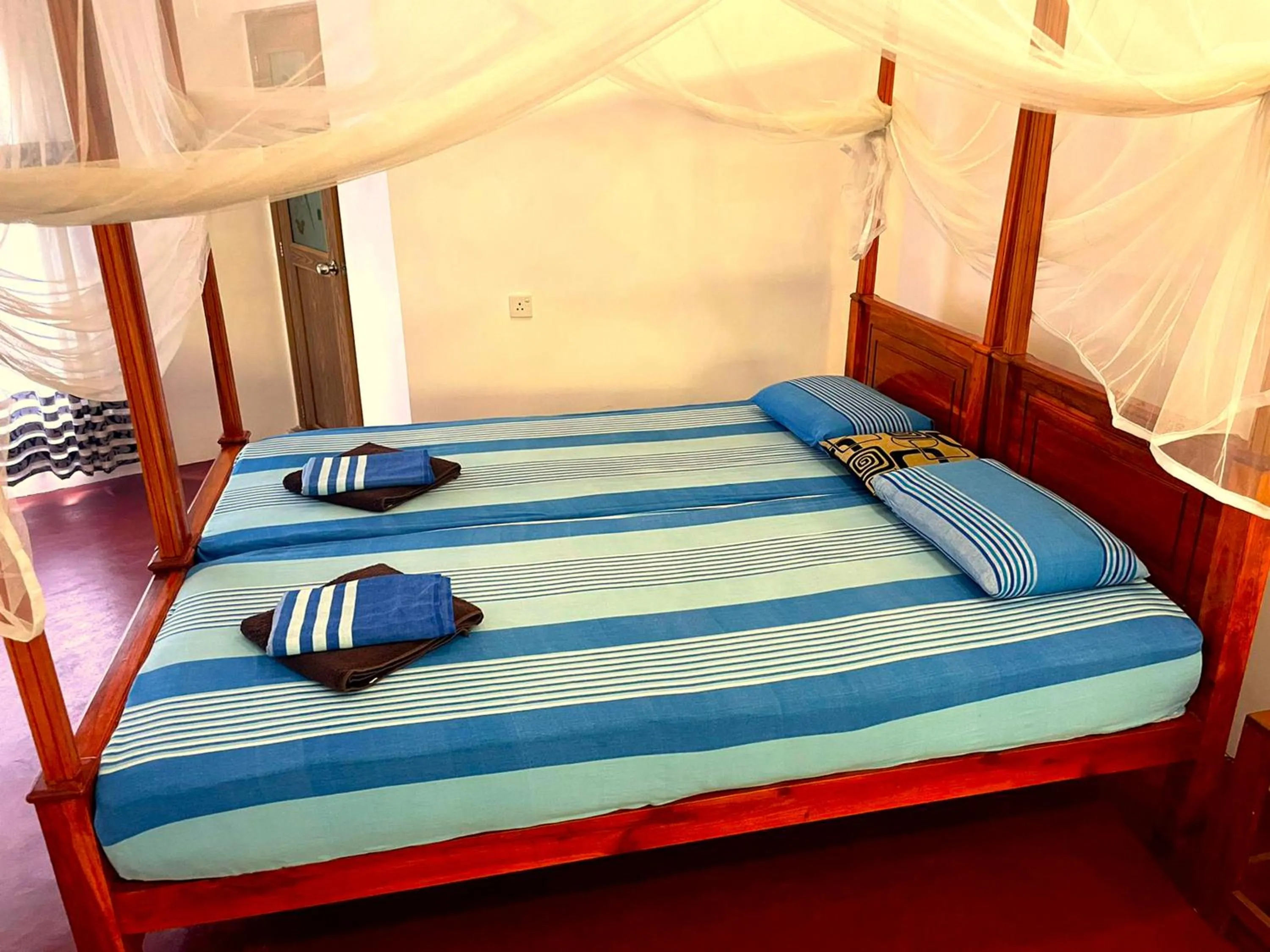 Bed in La Safari Inn Tissamaharama