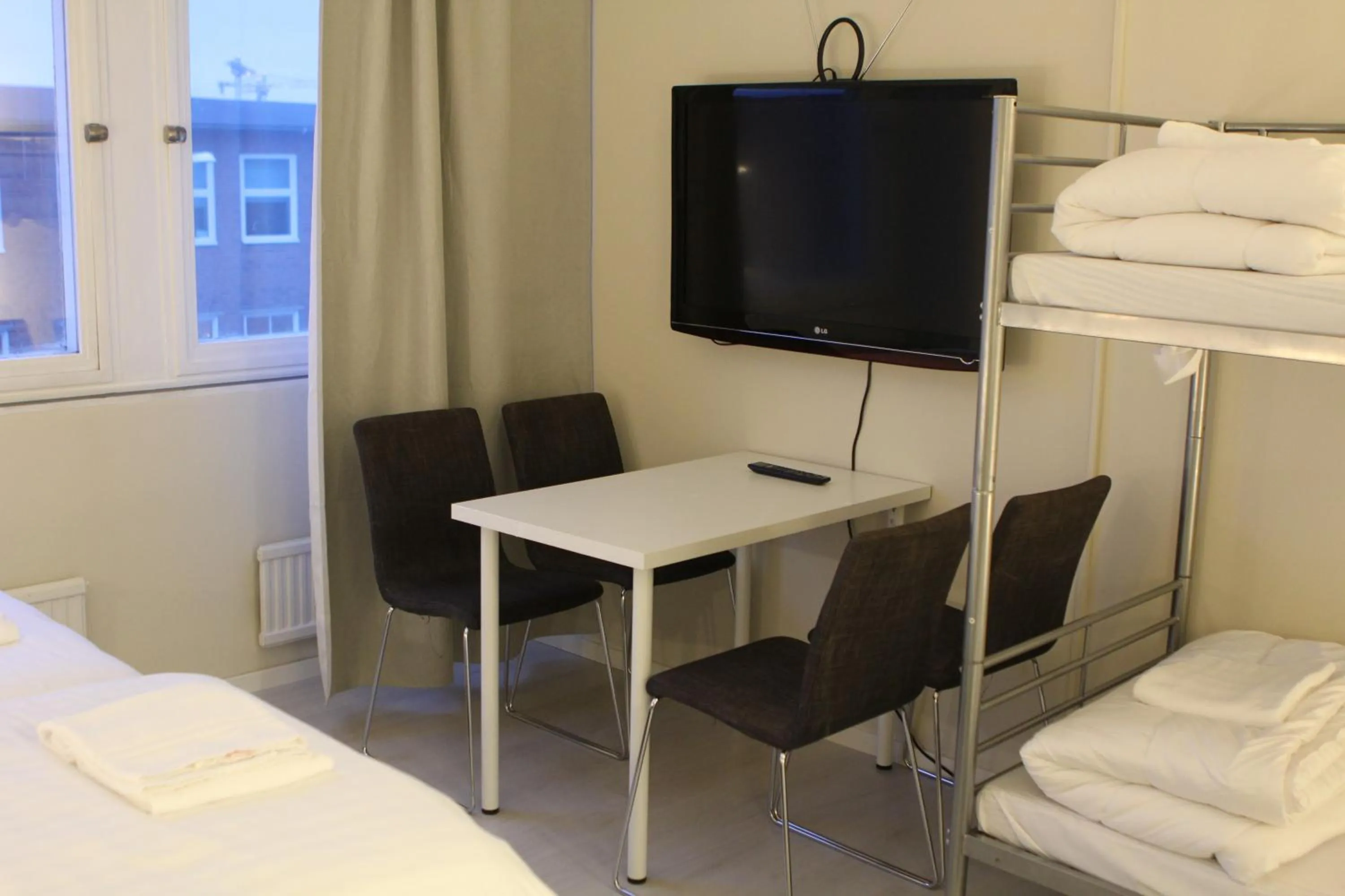 Dining area, Bed in Hotell Bromma