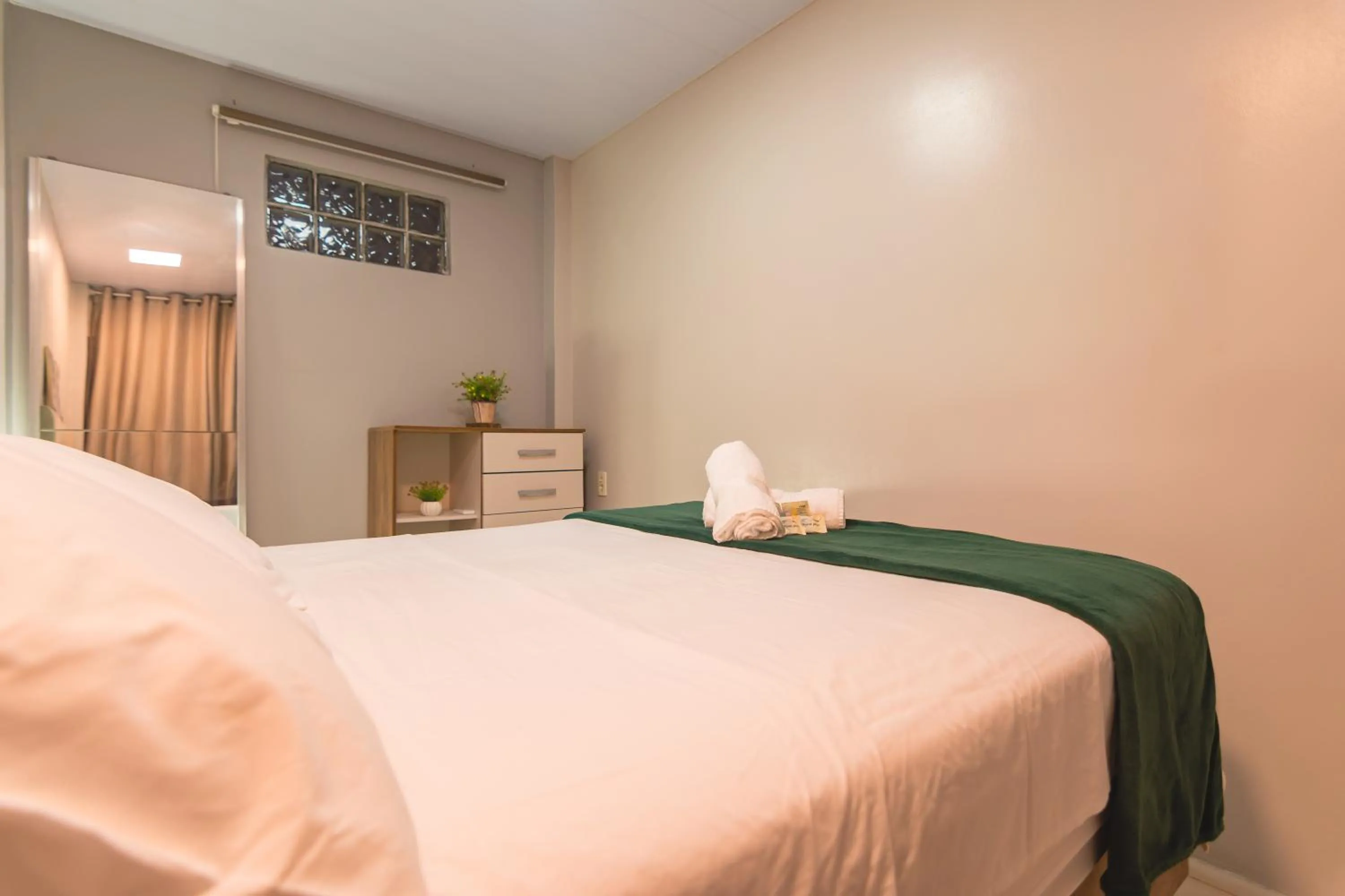 Bed in Flat Flores de Bombinhas Oficial