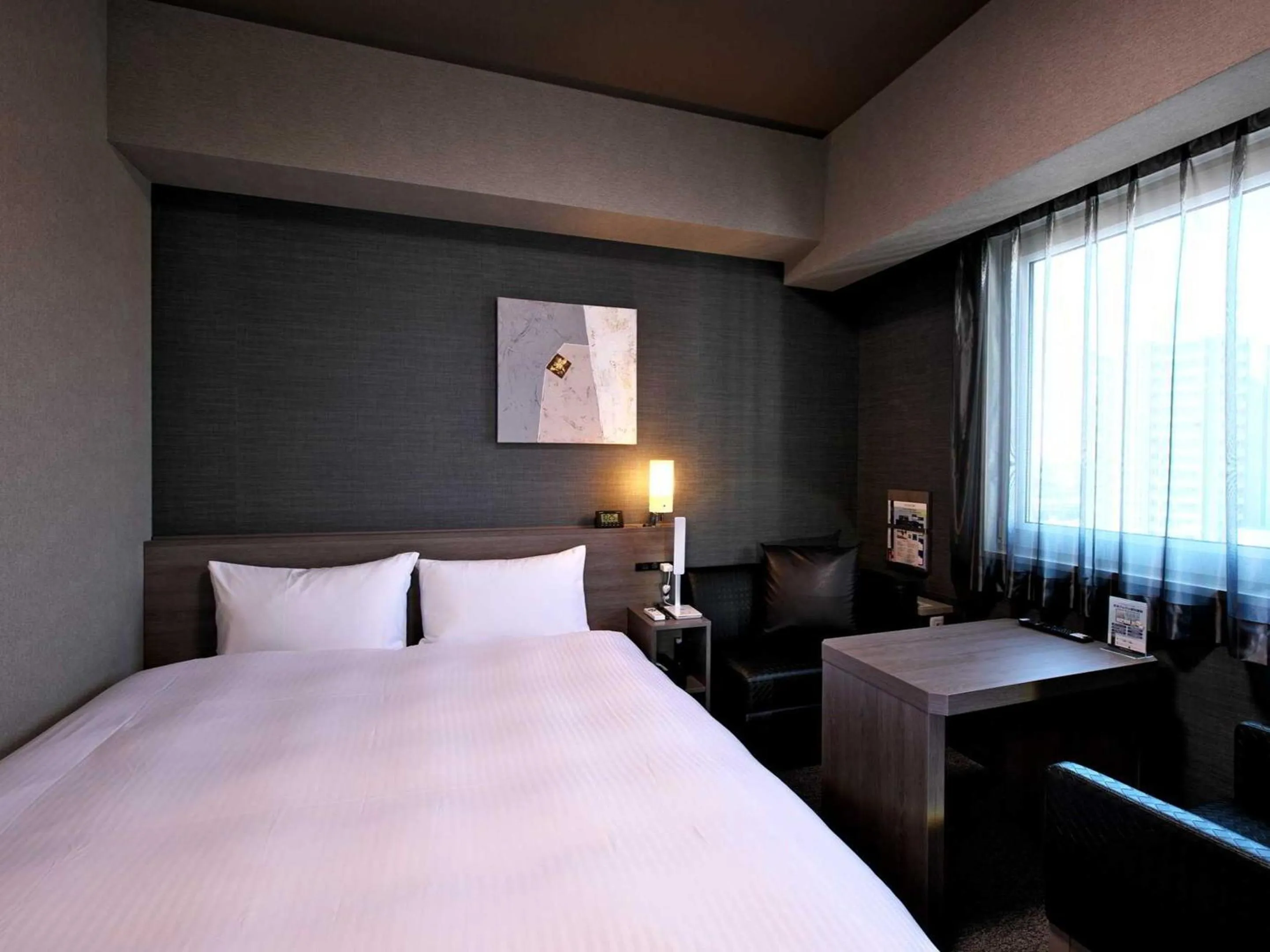 Photo of the whole room, Bed in Hotel Route Inn Grand Moriya Ekimae