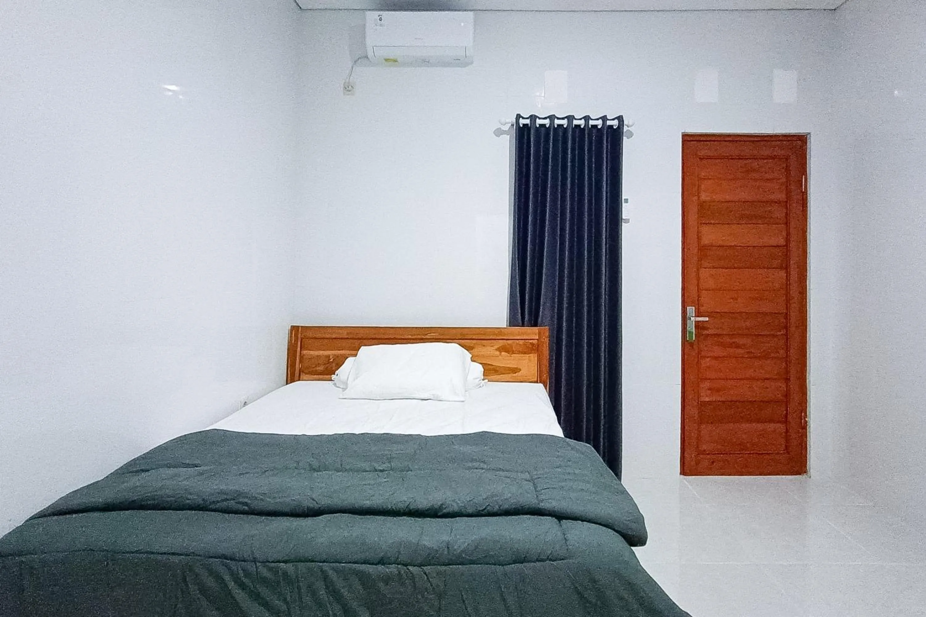 Widi Guest House near GWK Mitra RedDoorz