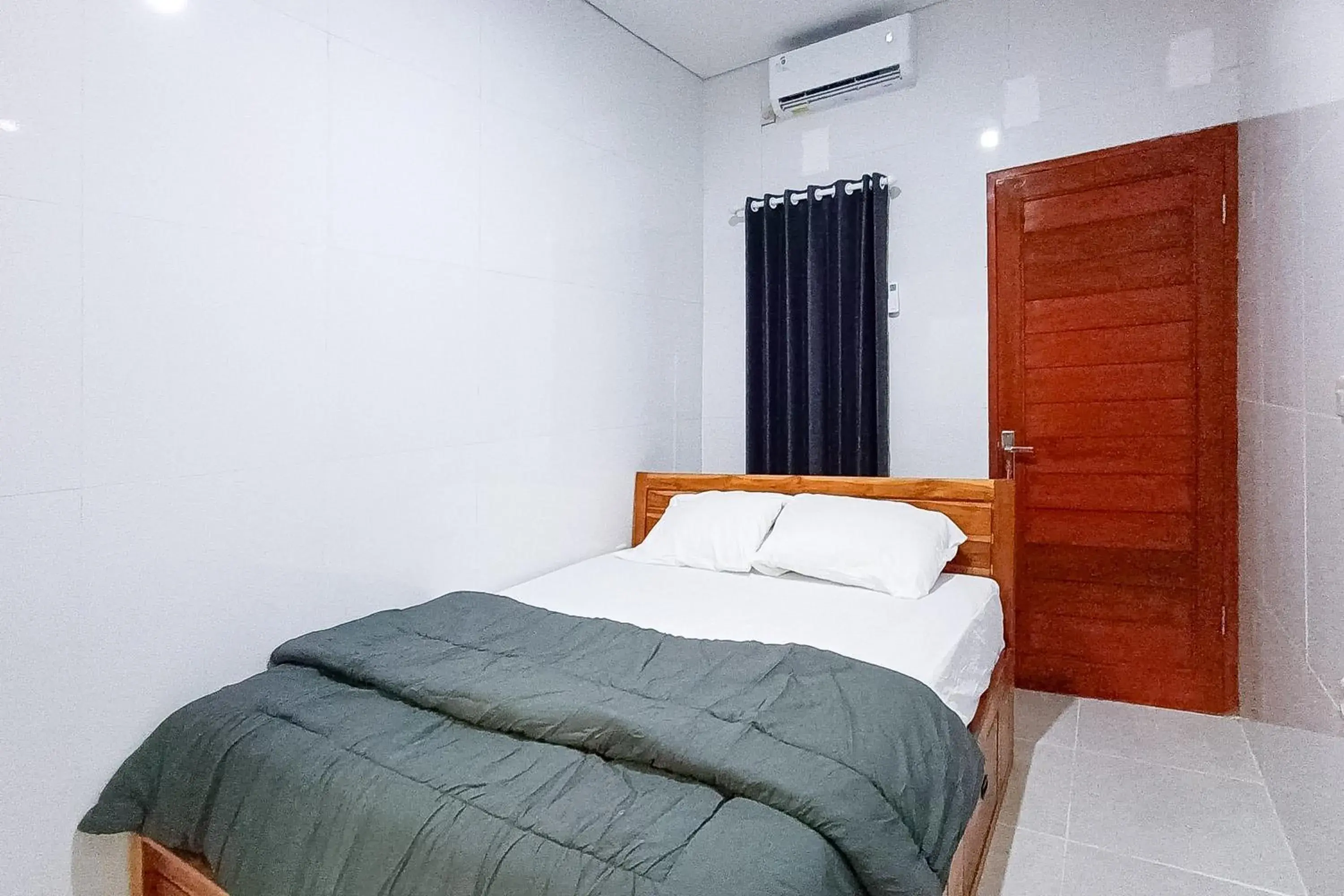 Widi Guest House near GWK Mitra RedDoorz Widi Guest House near GWK Mitra RedDoorz