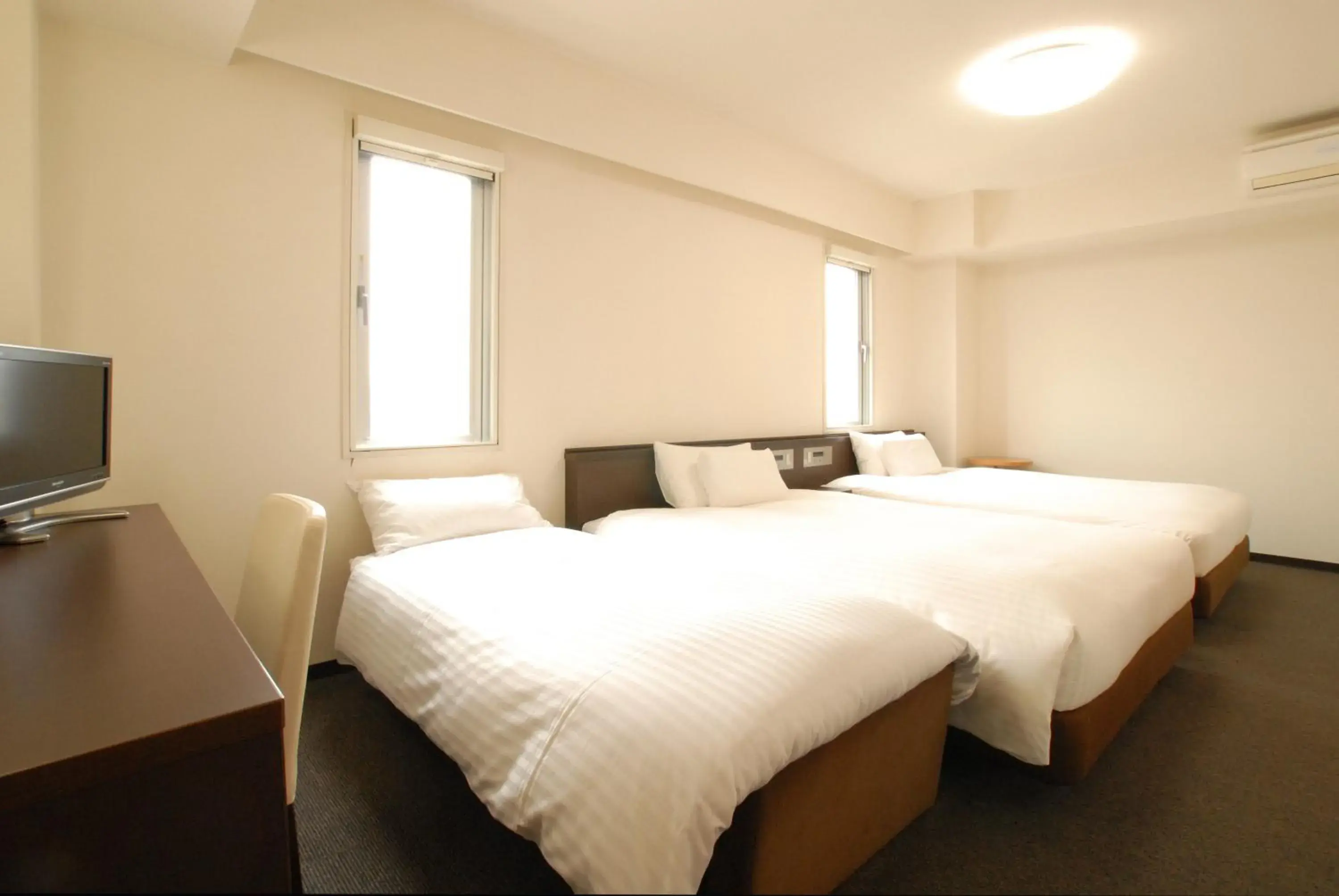 Bed in AB Hotel Okazaki Bed in AB Hotel Okazaki