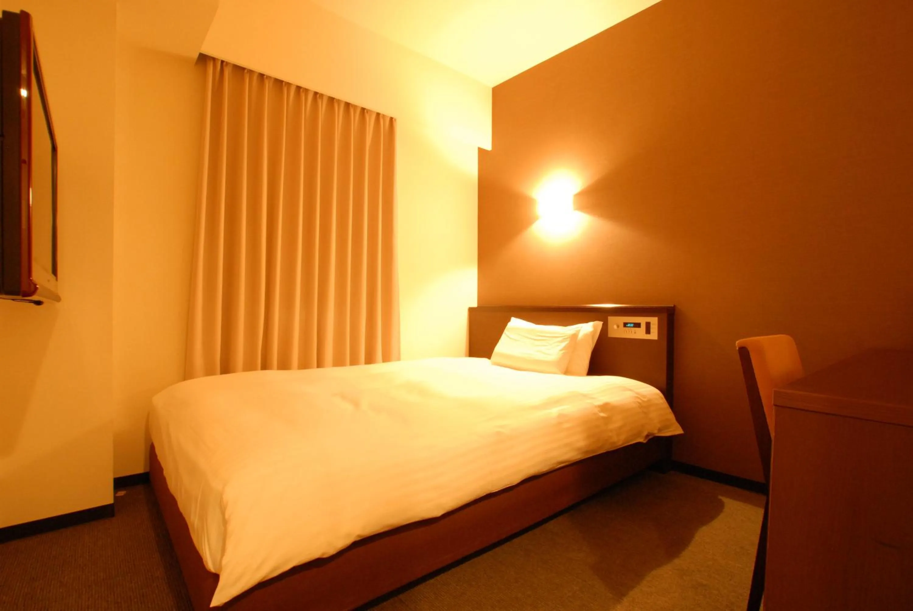 Bed in AB Hotel Okazaki