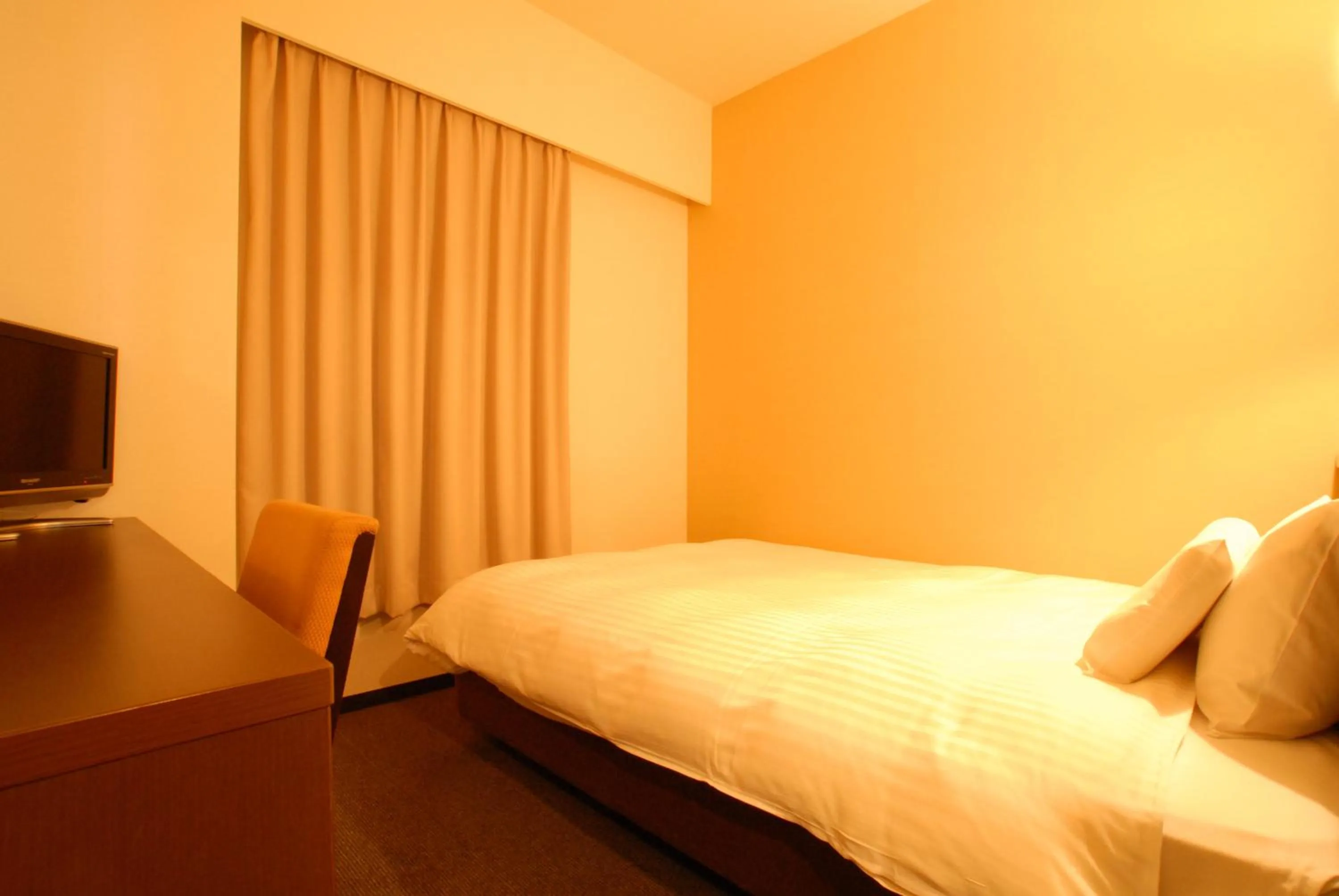 Bed in AB Hotel Okazaki