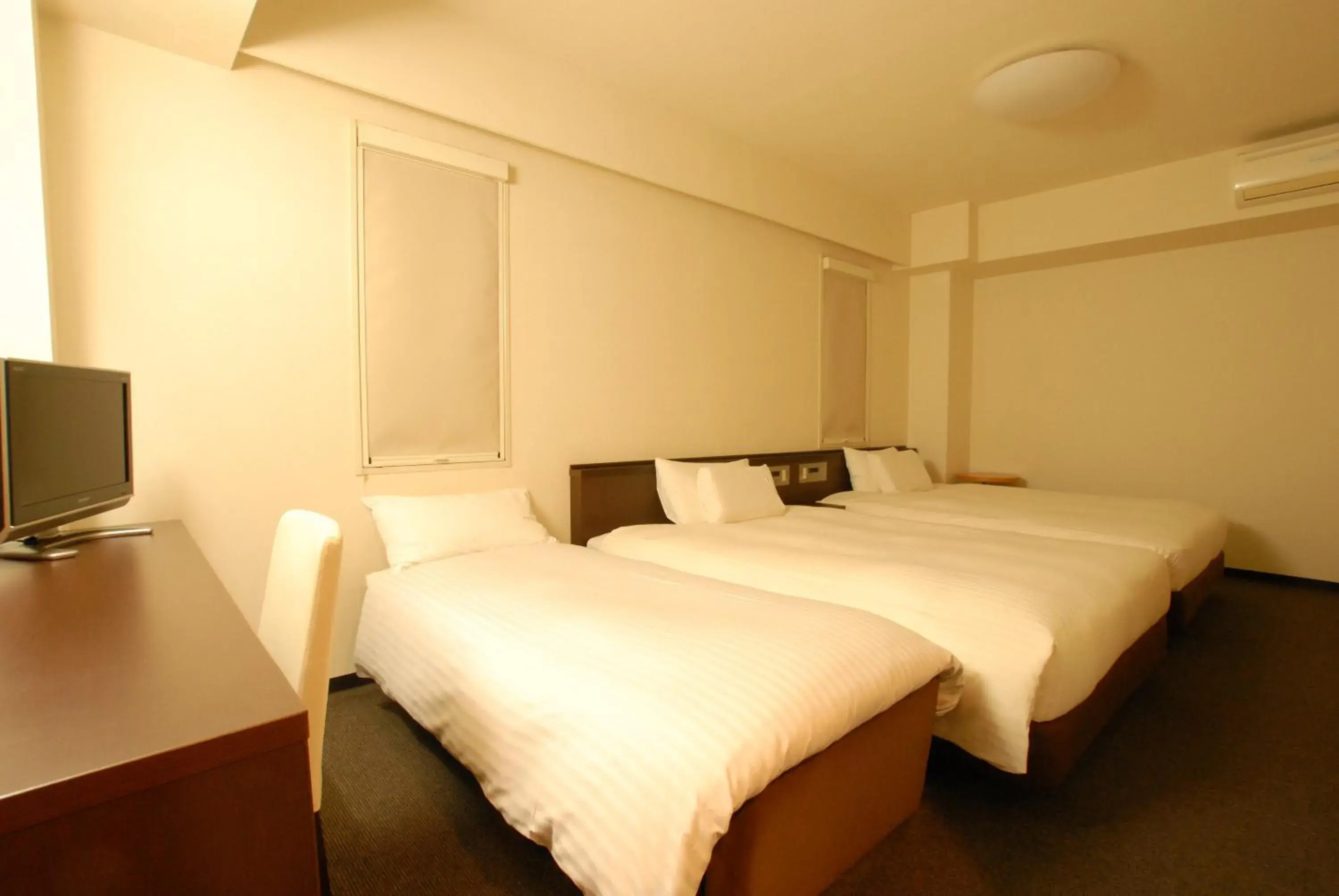 Bed in AB Hotel Okazaki Bed in AB Hotel Okazaki