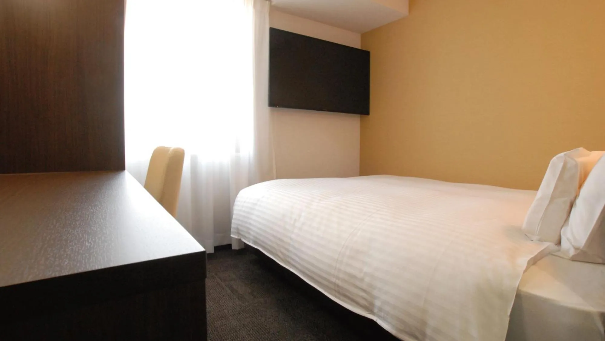 Bed in AB Hotel Kakamigahara