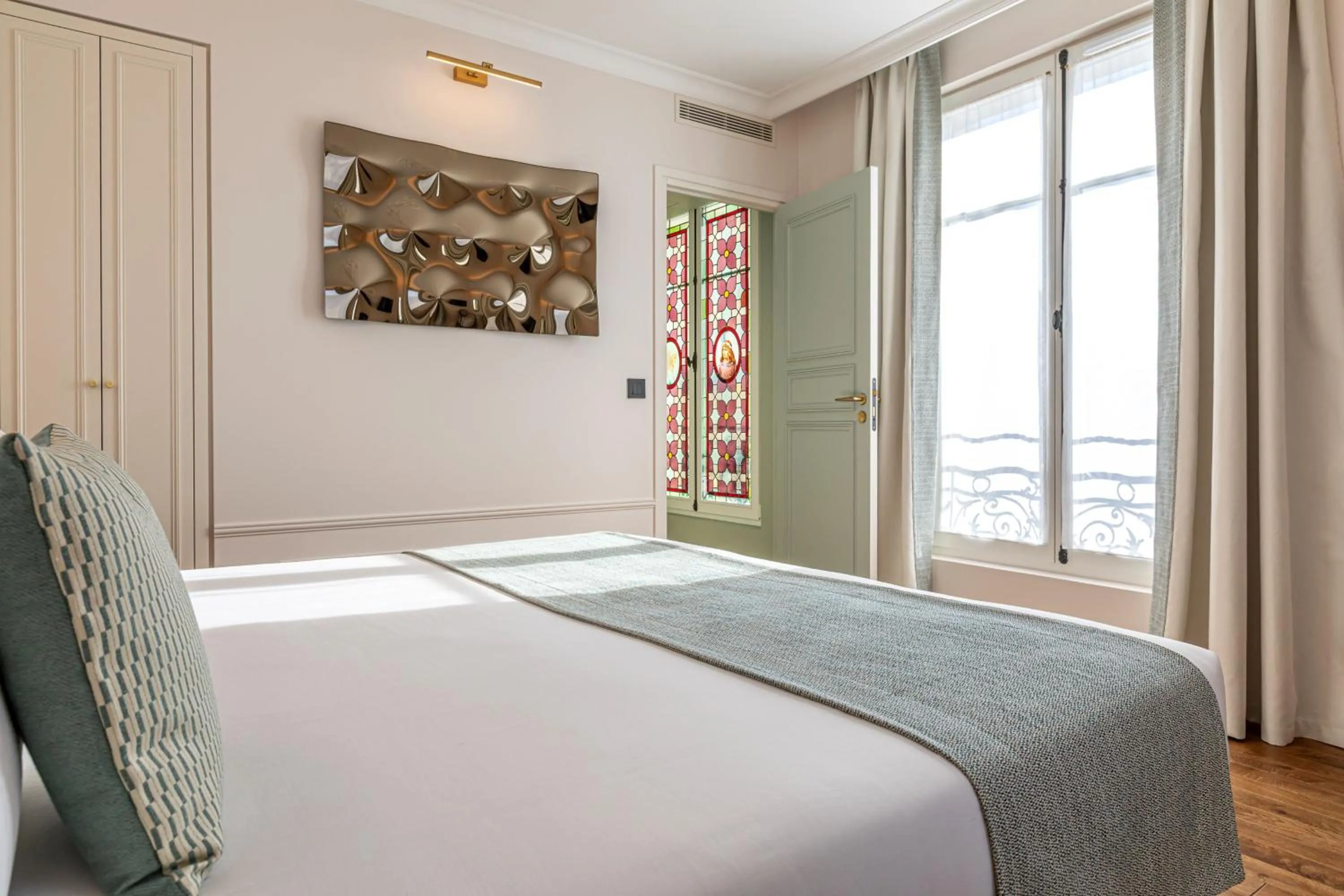 Bed in Villa SoPi Appart'Hotel by Patrick Hayat