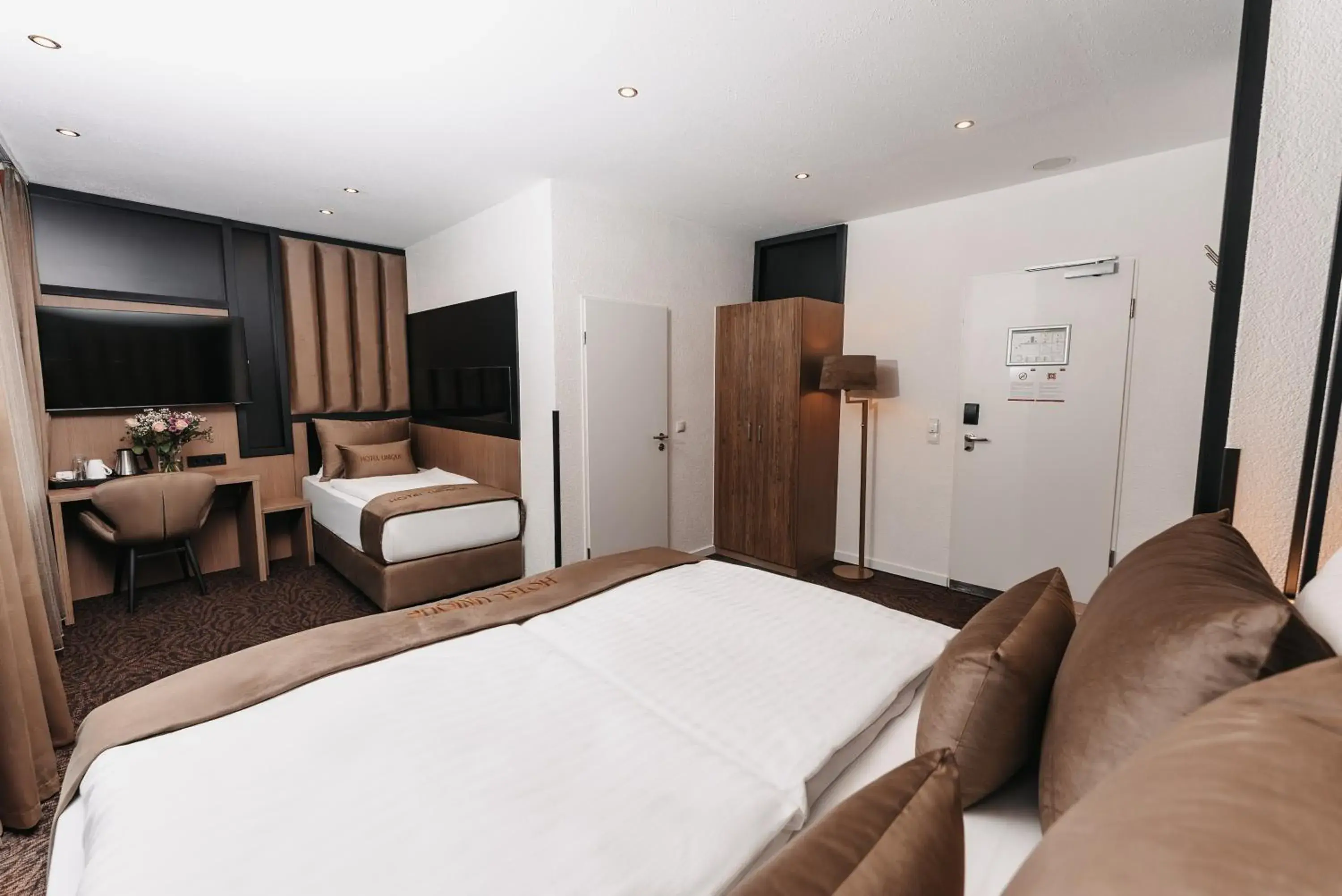 Deluxe Triple Room in Hotel Unique Majestic Deluxe Triple Room in Hotel Unique Majestic