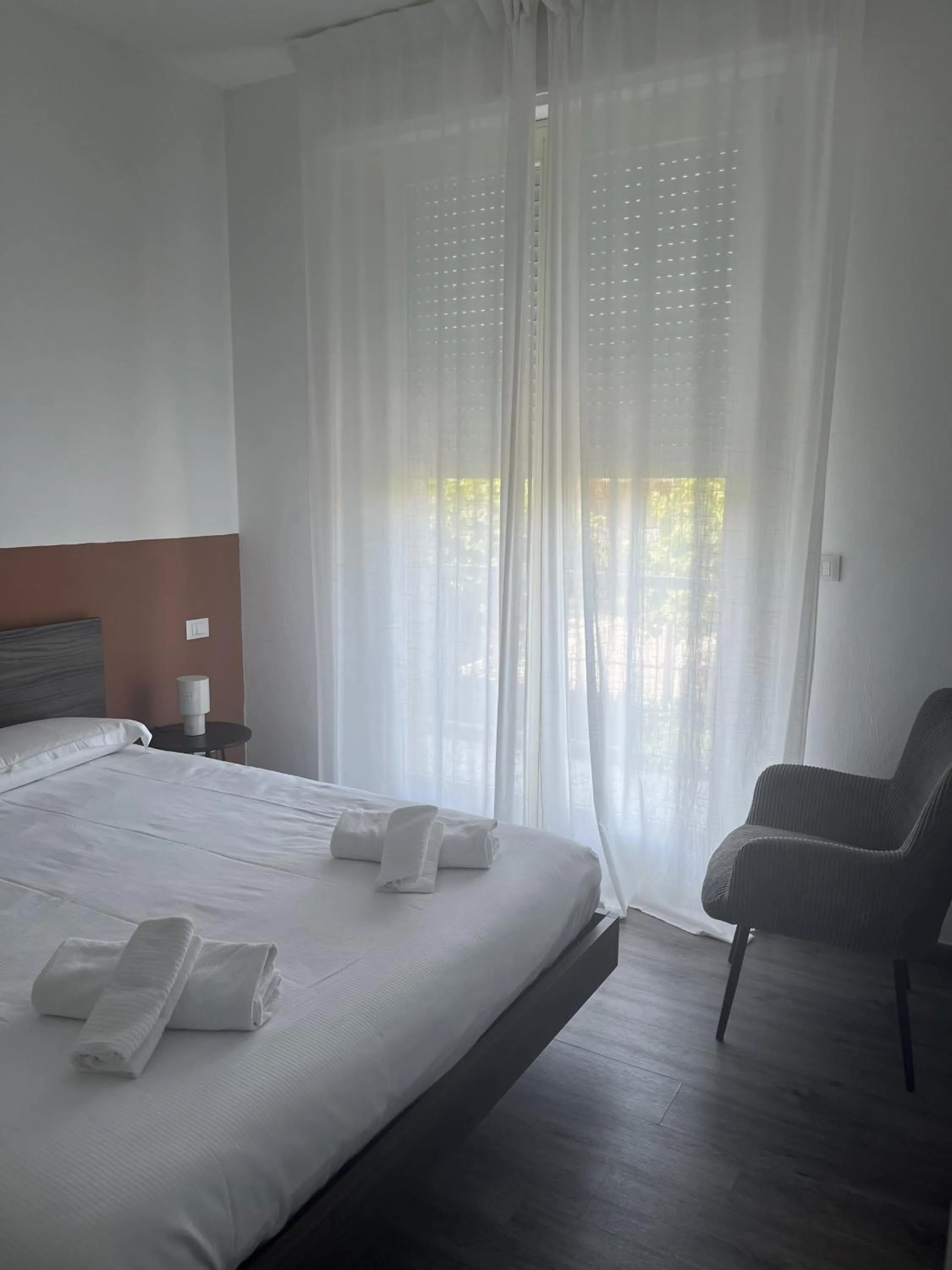 Bedroom, Bed in Poggio Al Lago Apartments & Rooms