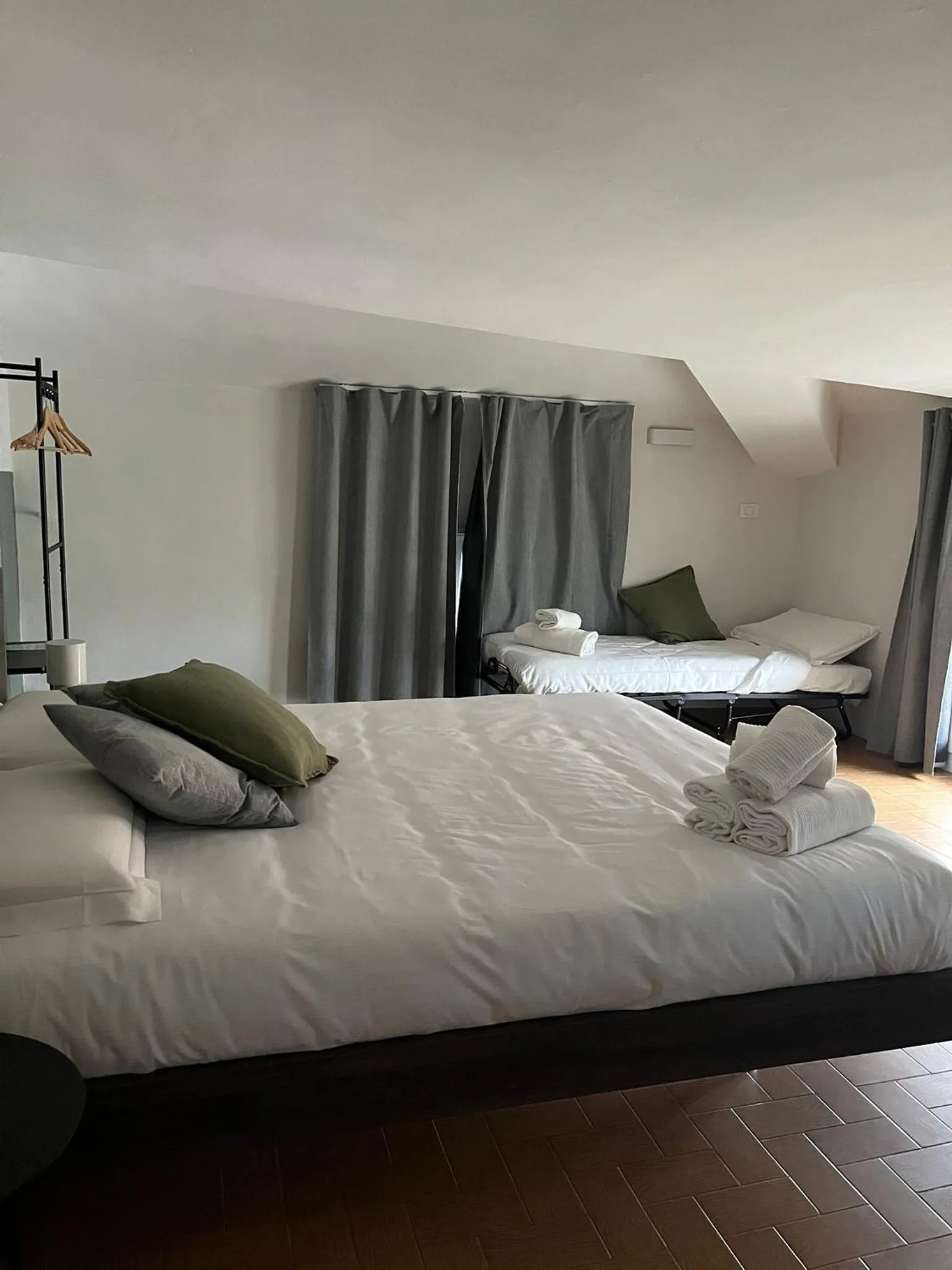 Bedroom, Bed in Poggio Al Lago Apartments & Rooms