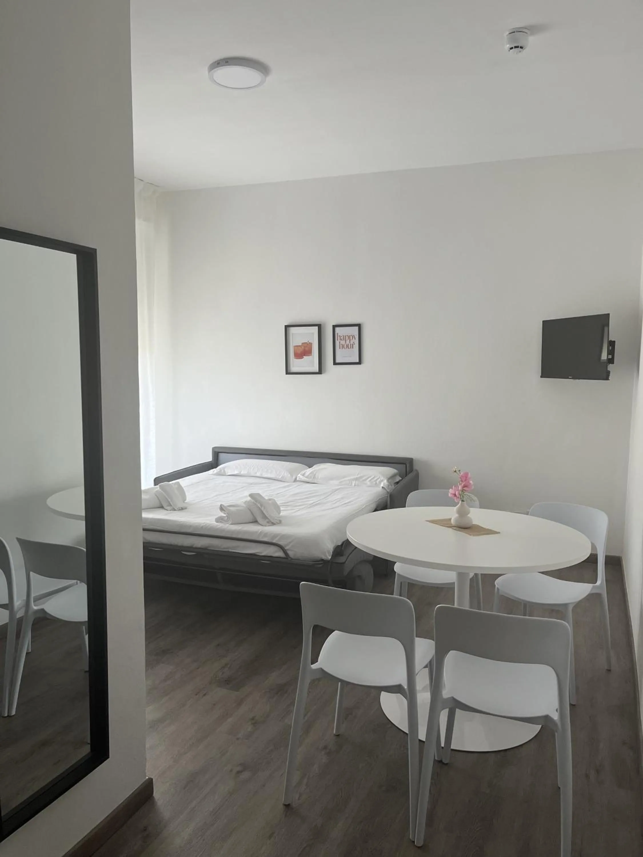 Living room, Bed in Poggio Al Lago Apartments & Rooms