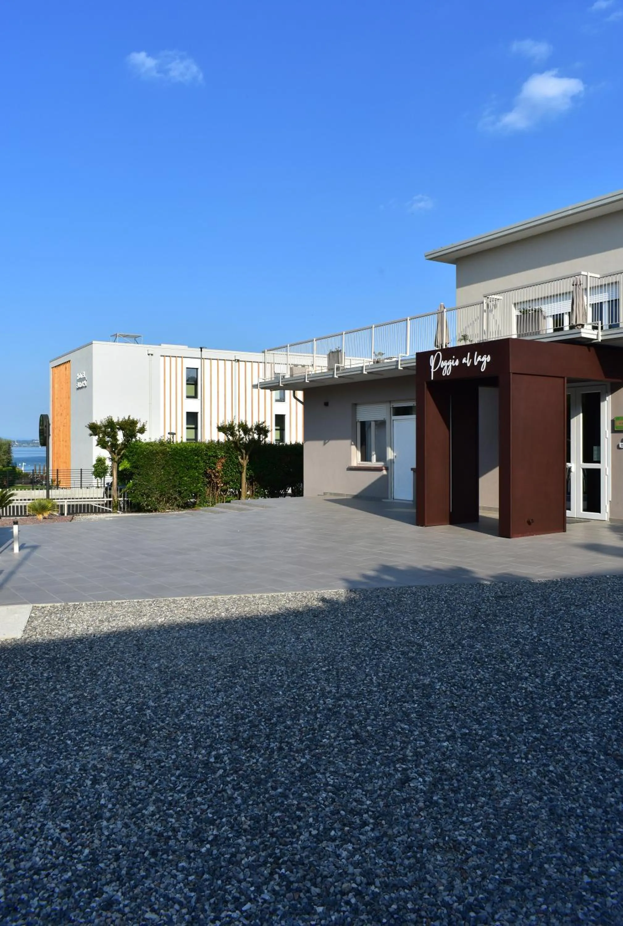 Property building in Poggio Al Lago Apartments & Rooms
