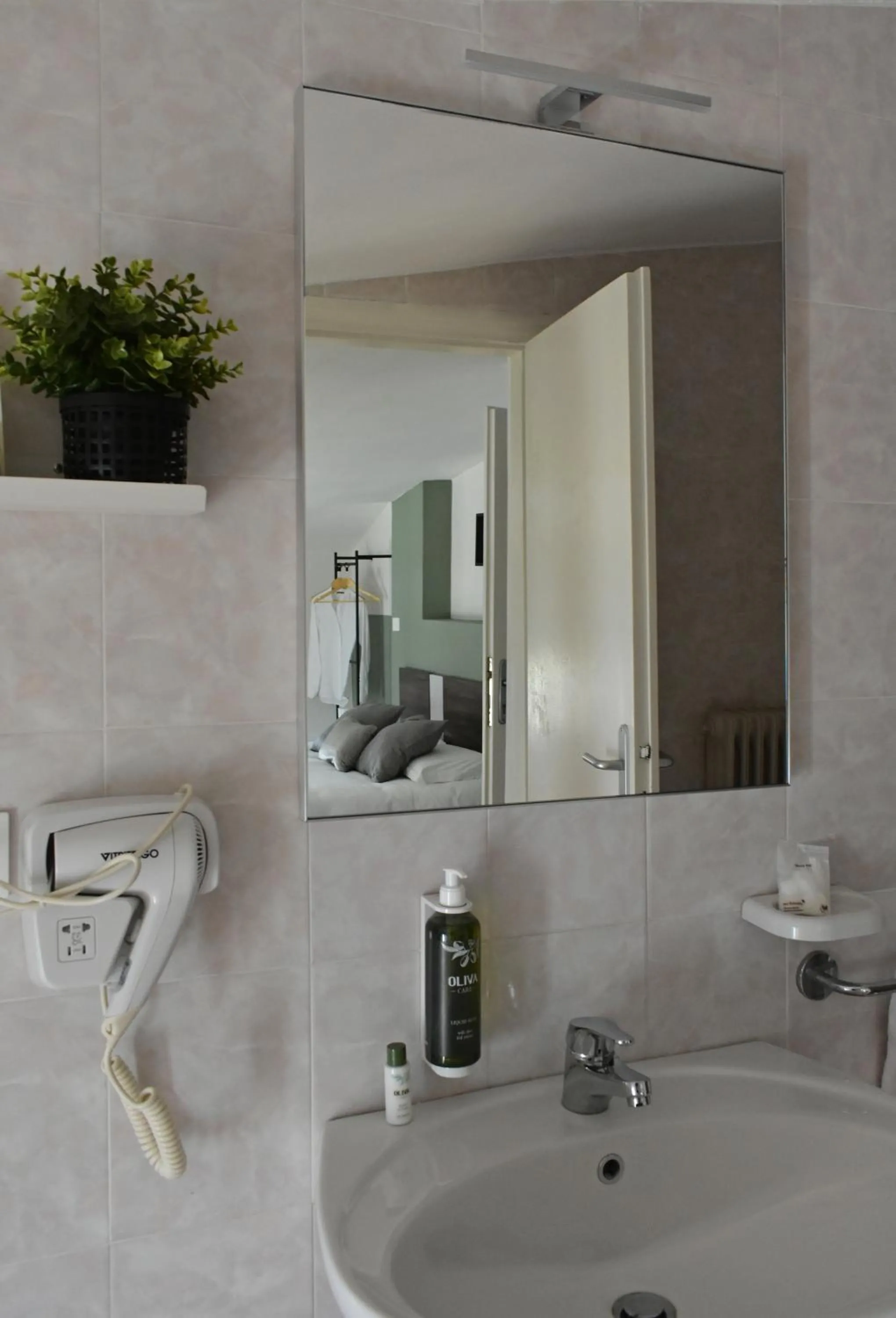 Bathroom in Poggio Al Lago Apartments & Rooms