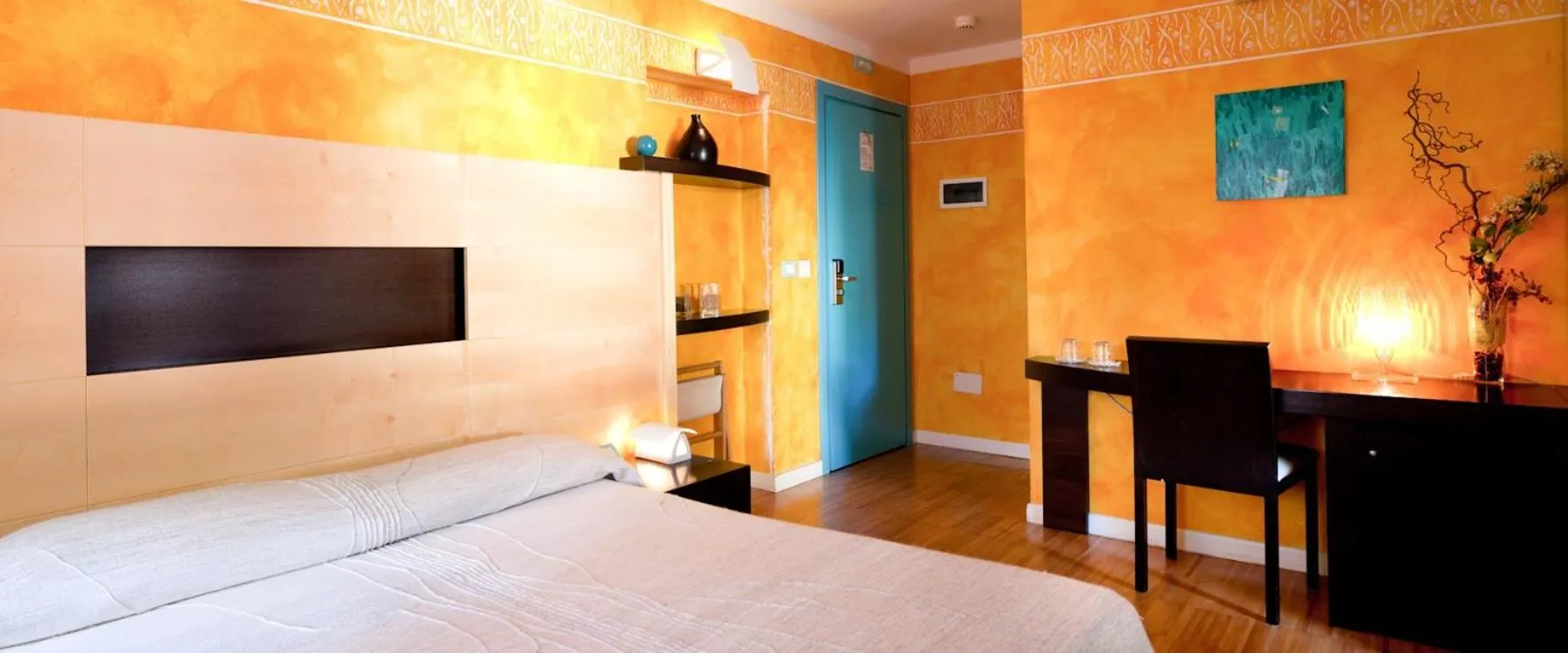 Bed in Hotel Suite Inn