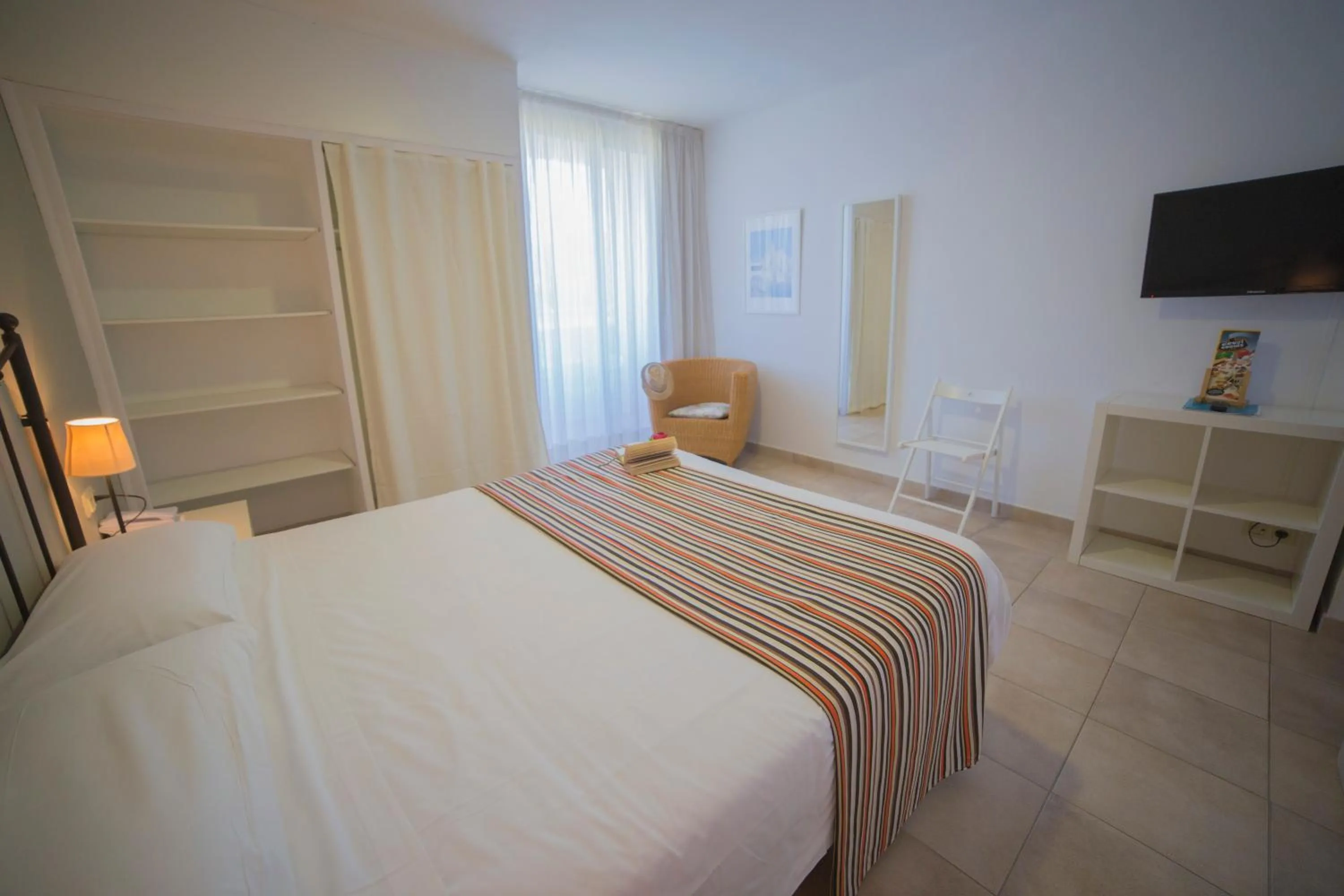 Bed in Casa Del Mar Hotel & Apartaments