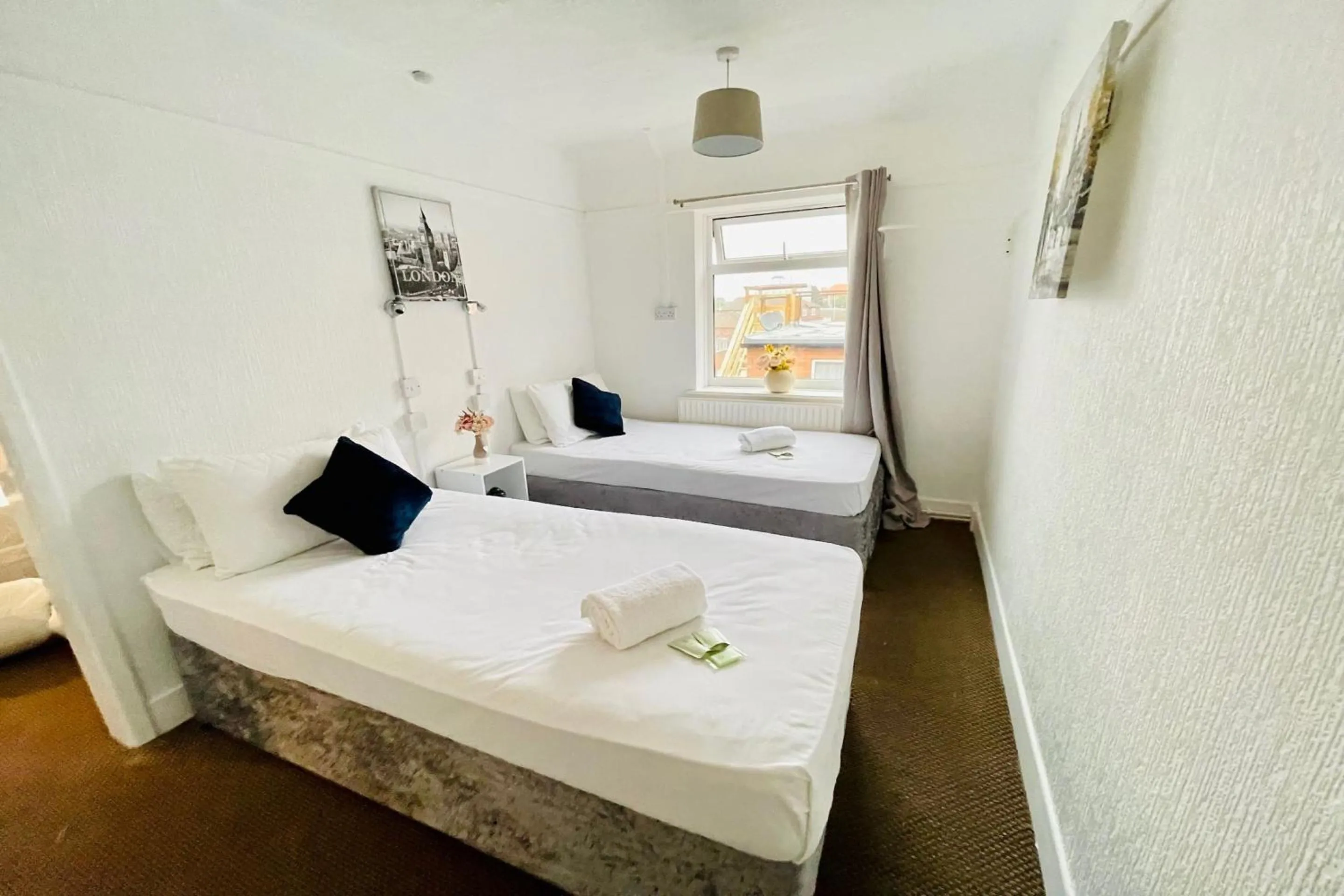 Bedroom in OYO The Sun Hotel