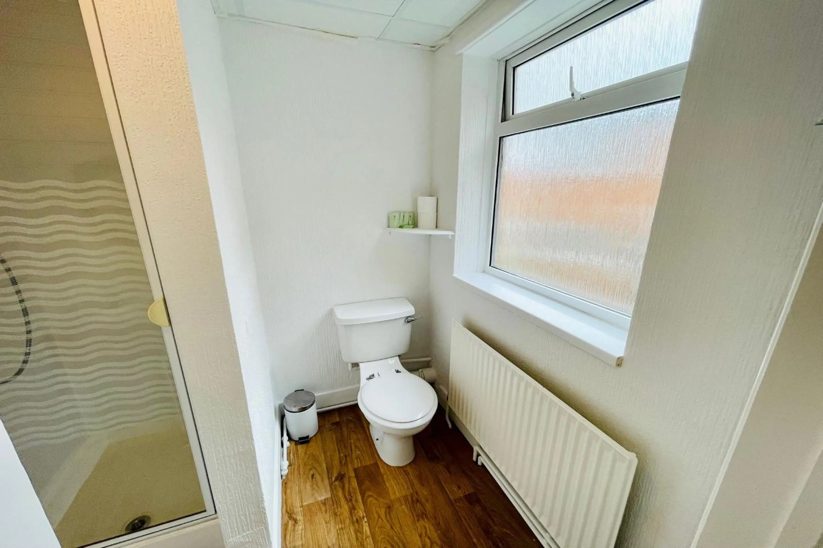 Bathroom in OYO The Sun Hotel