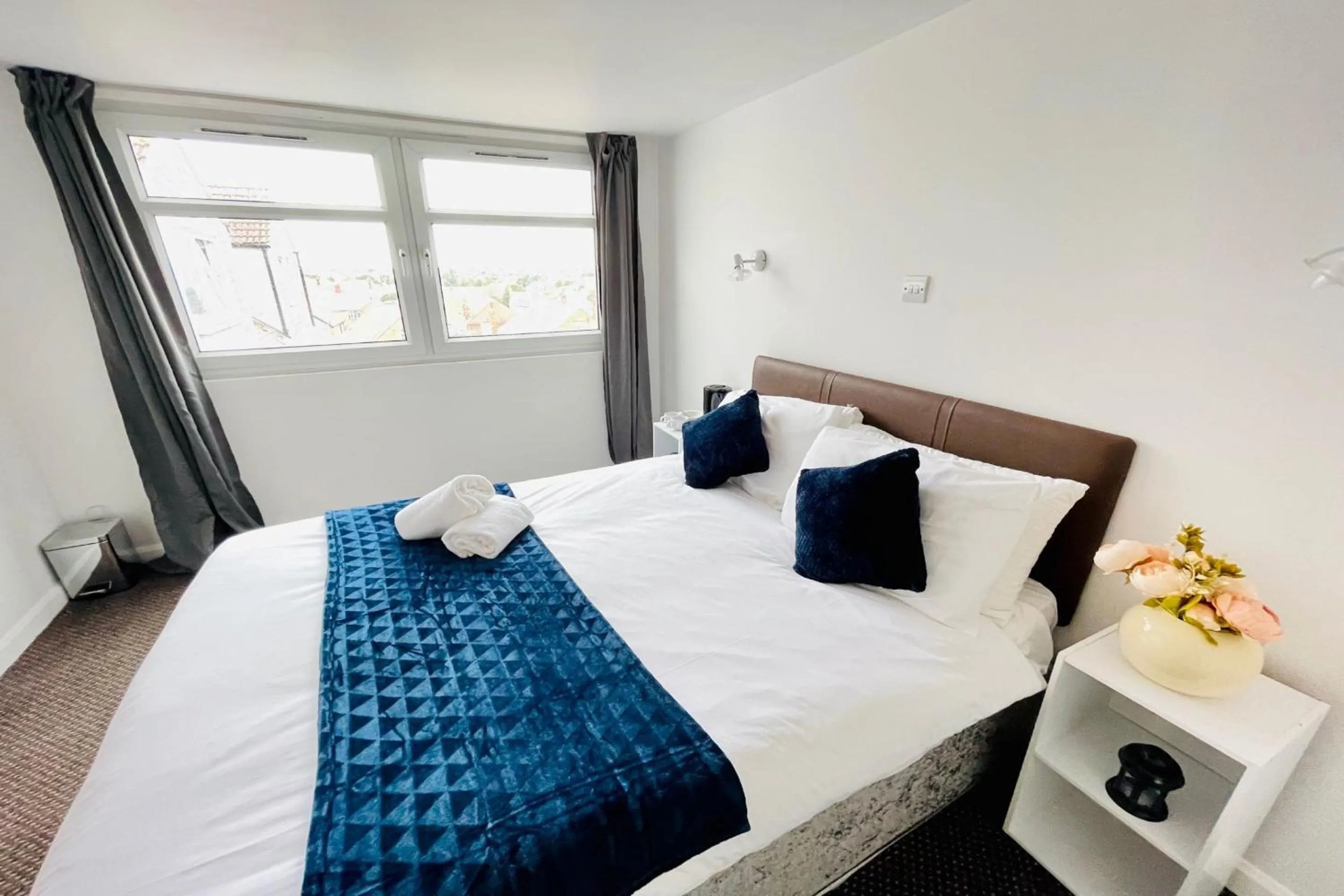 Bedroom in OYO The Sun Hotel