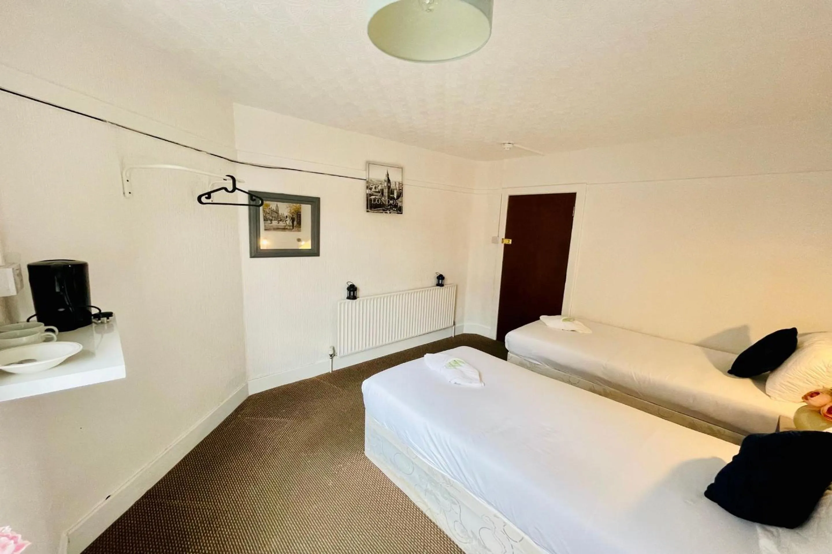 Bedroom in OYO The Sun Hotel