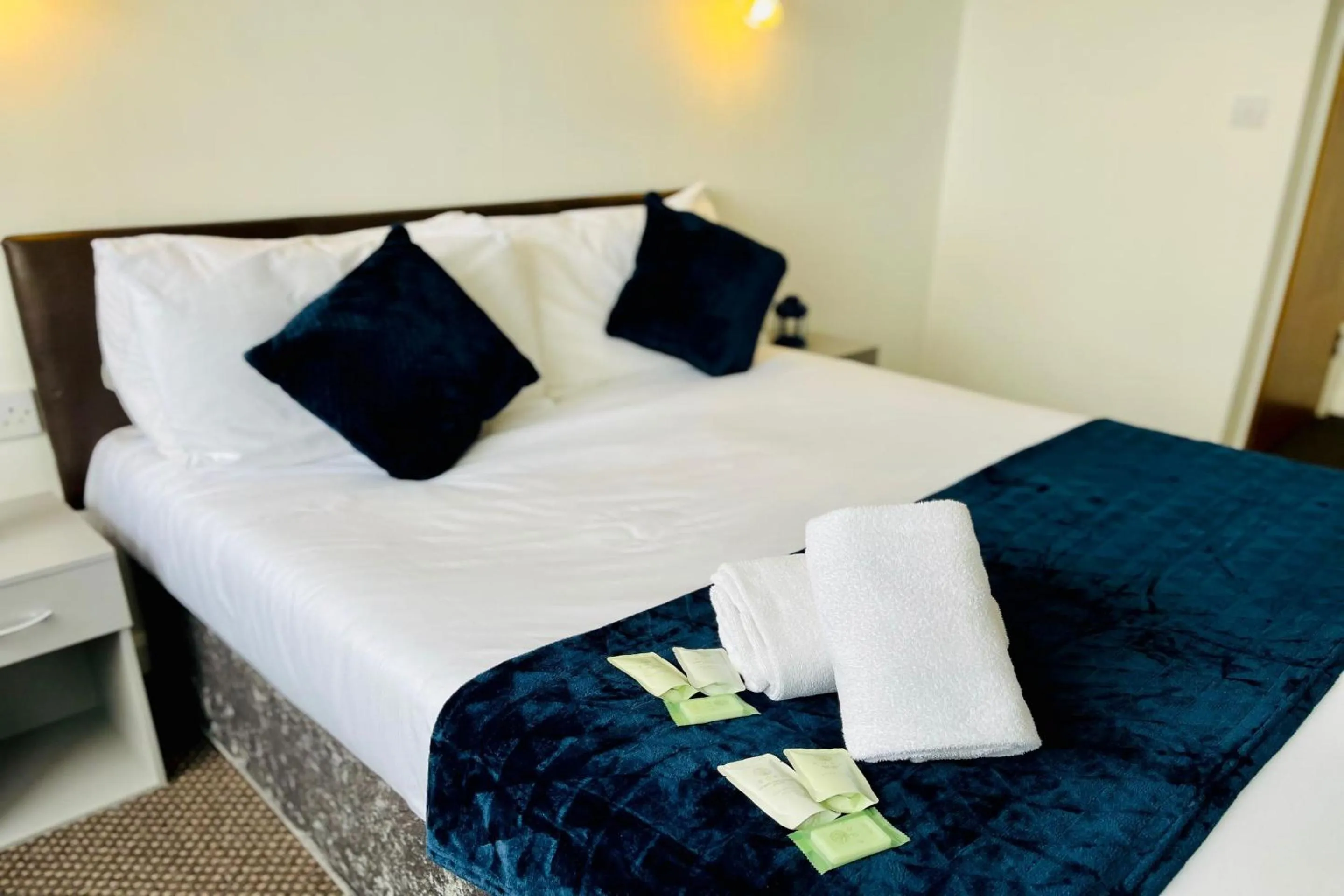 Bedroom in OYO The Sun Hotel