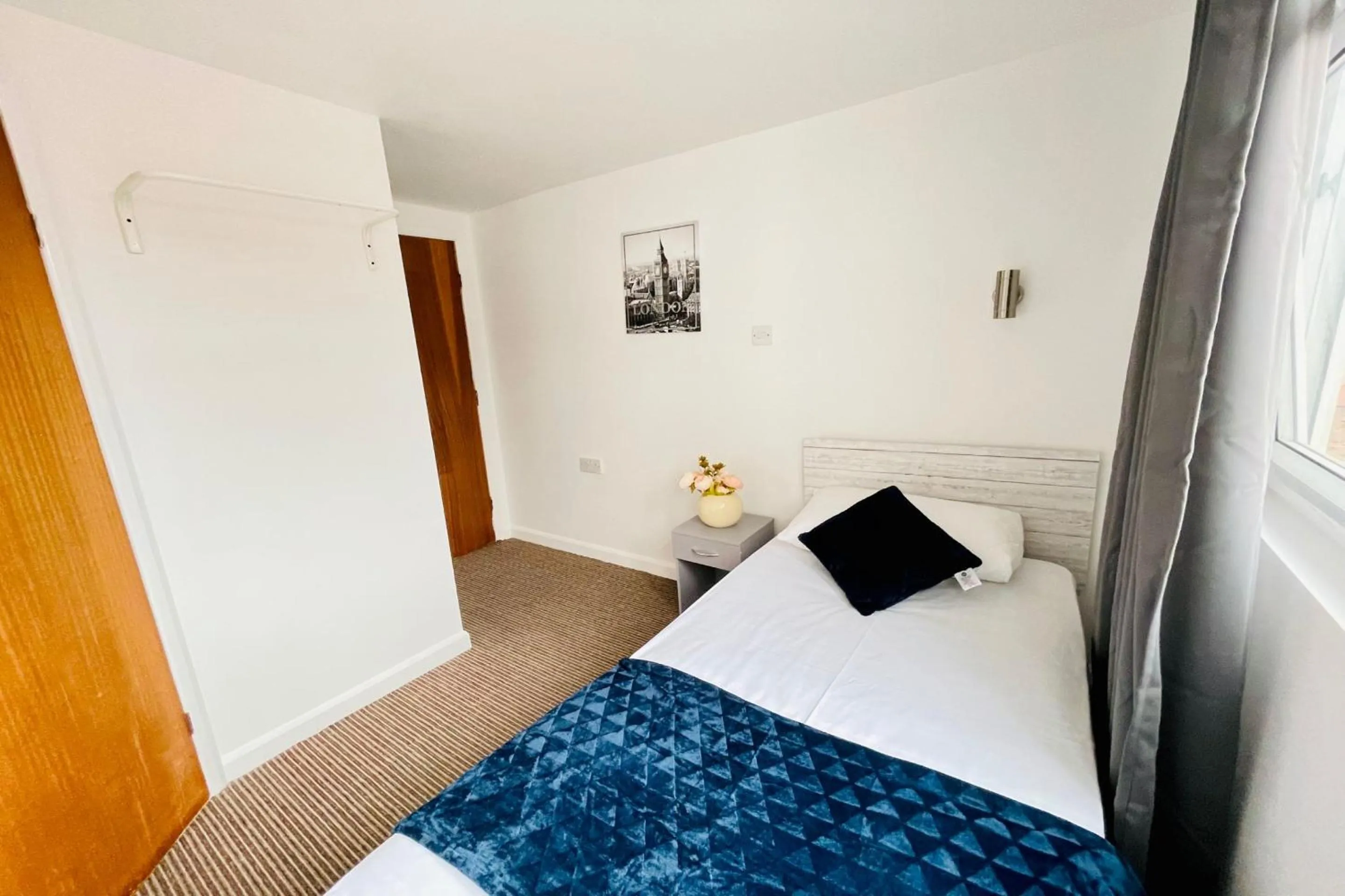 Bedroom in OYO The Sun Hotel