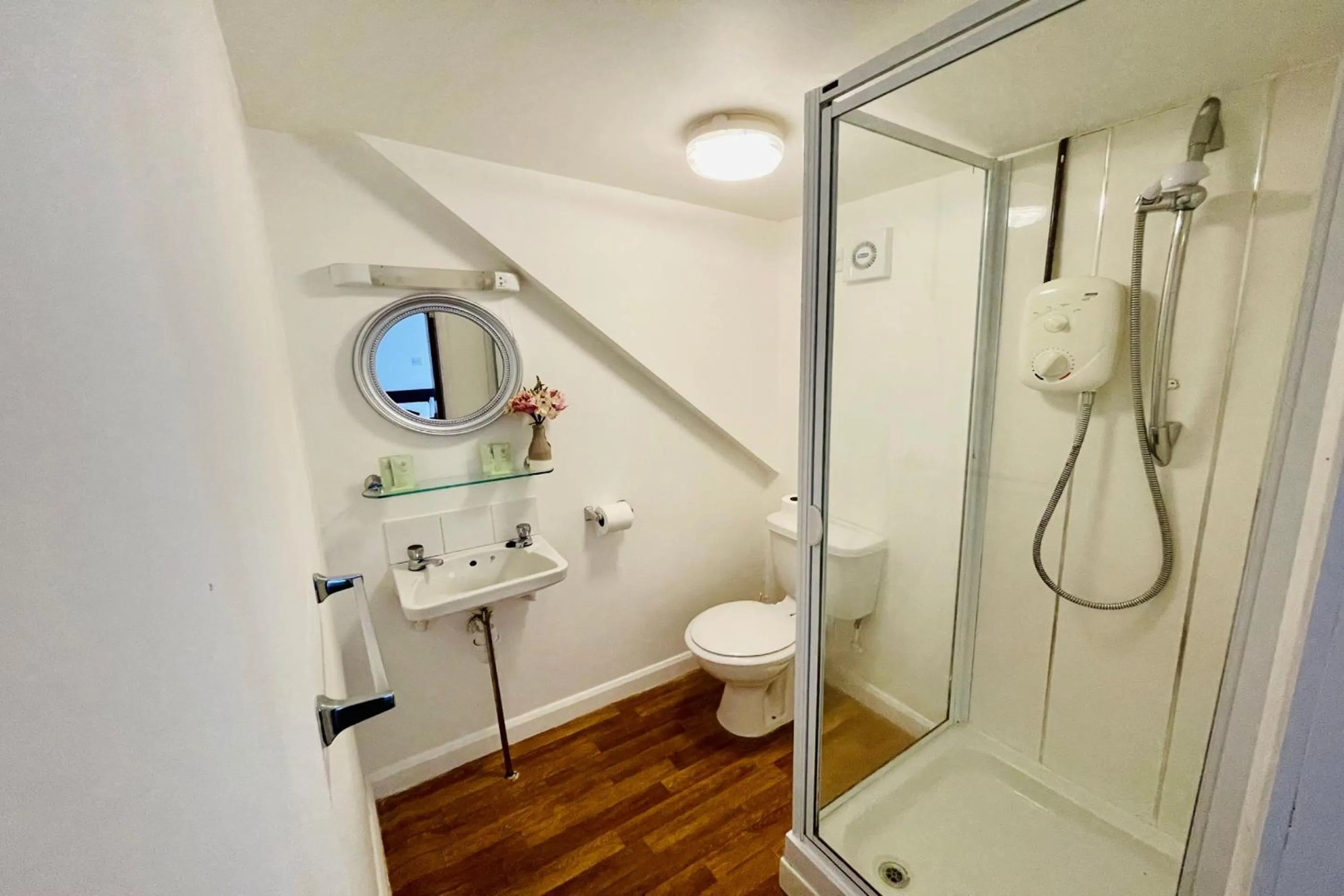 Bathroom in OYO The Sun Hotel