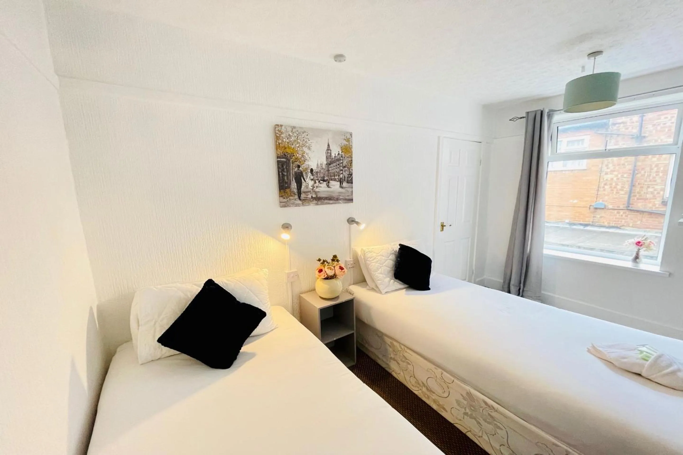 Bedroom in OYO The Sun Hotel