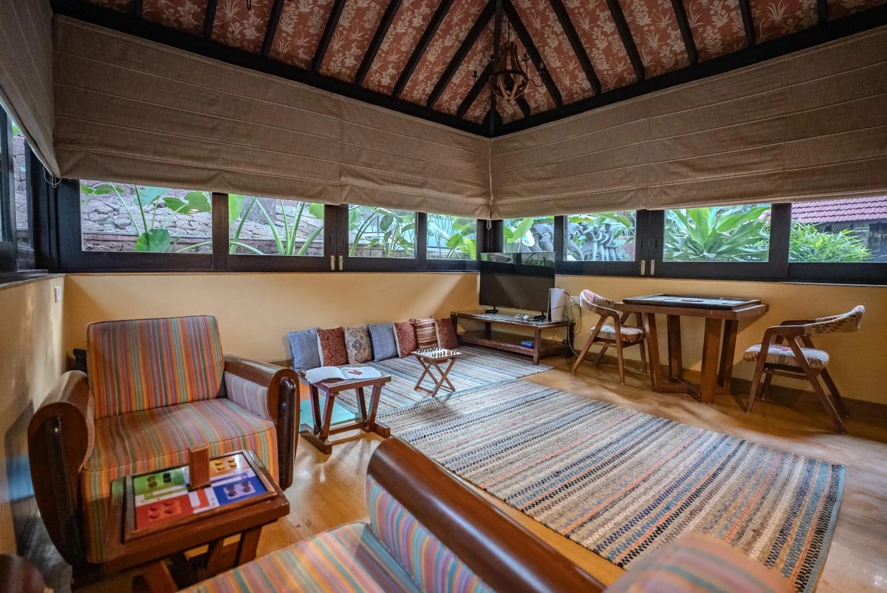 Communal lounge/ TV room in Brij Paraiso Saligao, Goa - An Indo-Portuguese Villa