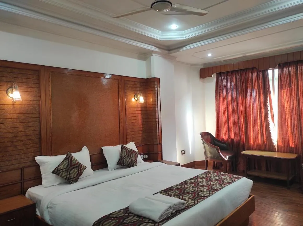 Bed in Hotel Ambarish Grand Residency