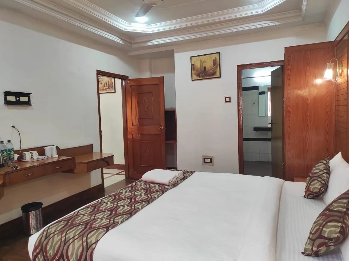 Bed in Hotel Ambarish Grand Residency