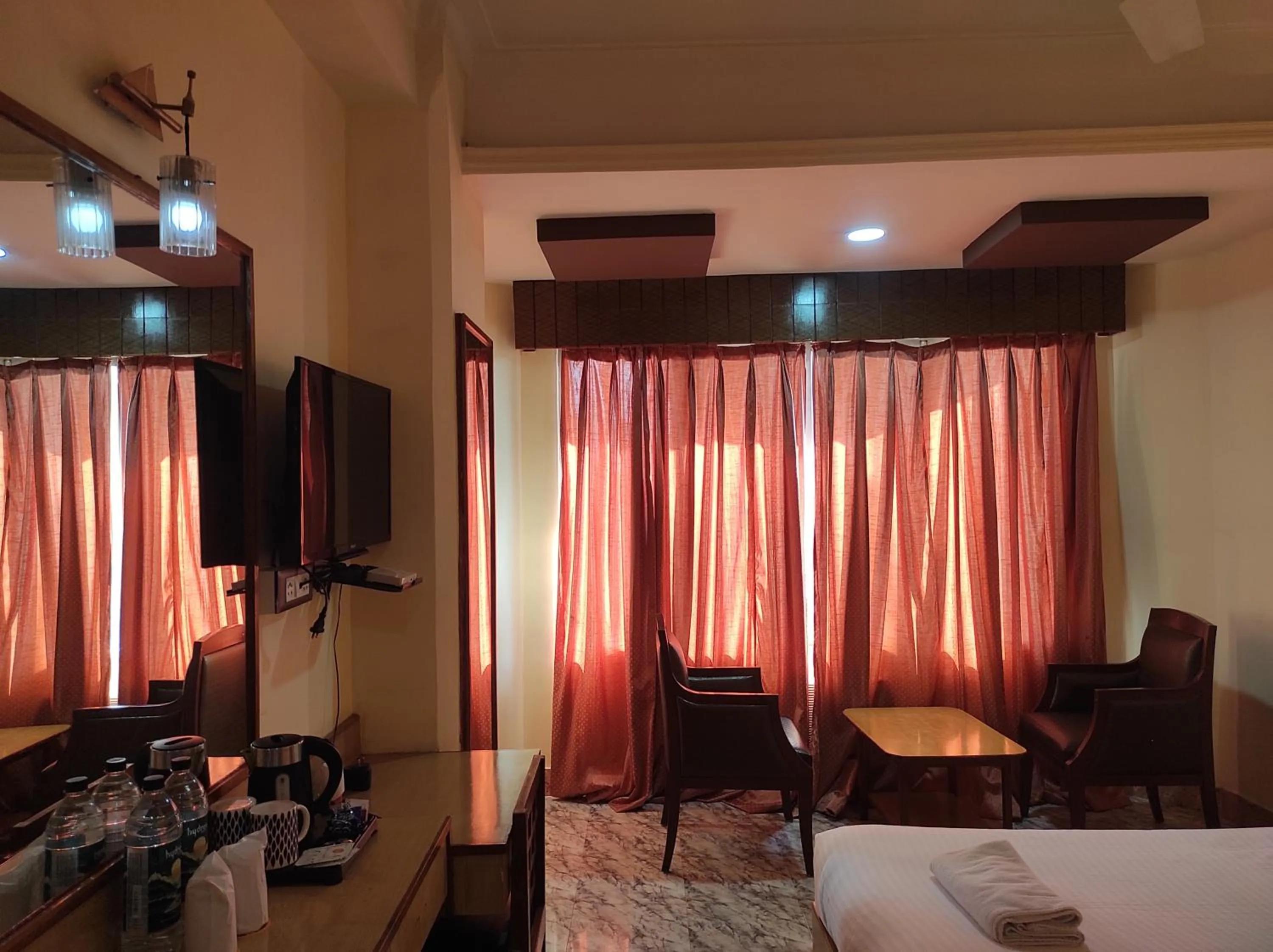 TV and multimedia in Hotel Ambarish Grand Residency