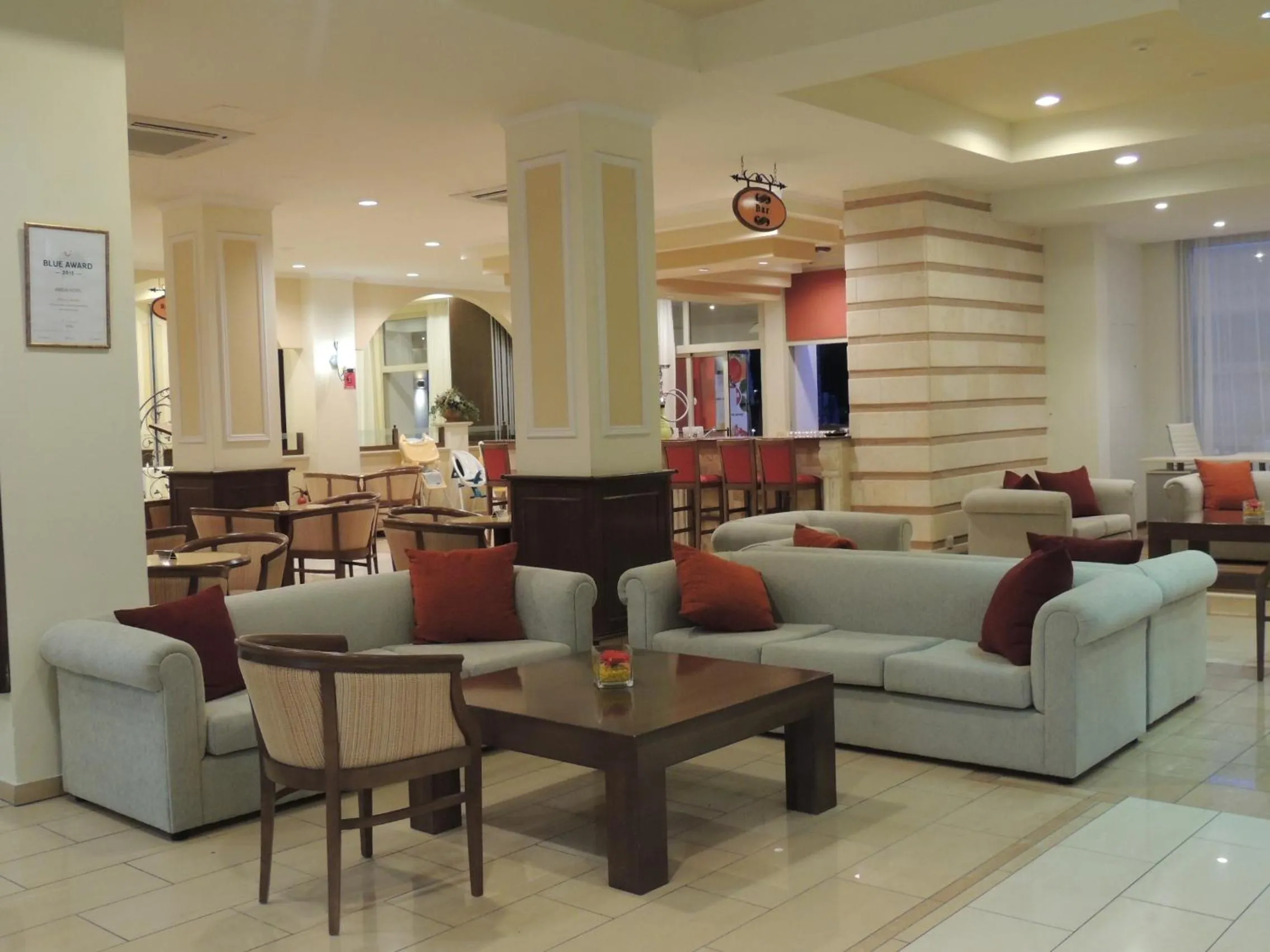 Communal lounge/ TV room in Anesis Hotel