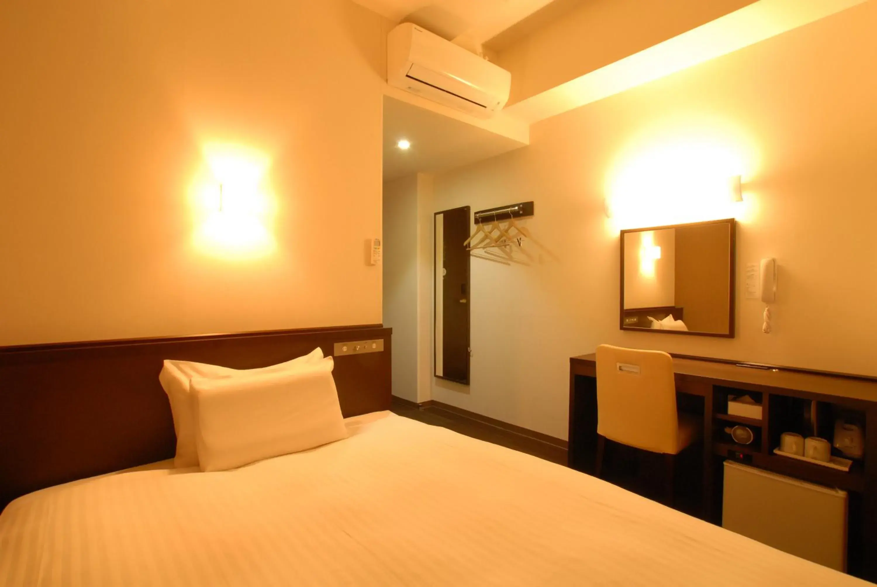 Bed in AB Hotel Komaki Bed in AB Hotel Komaki