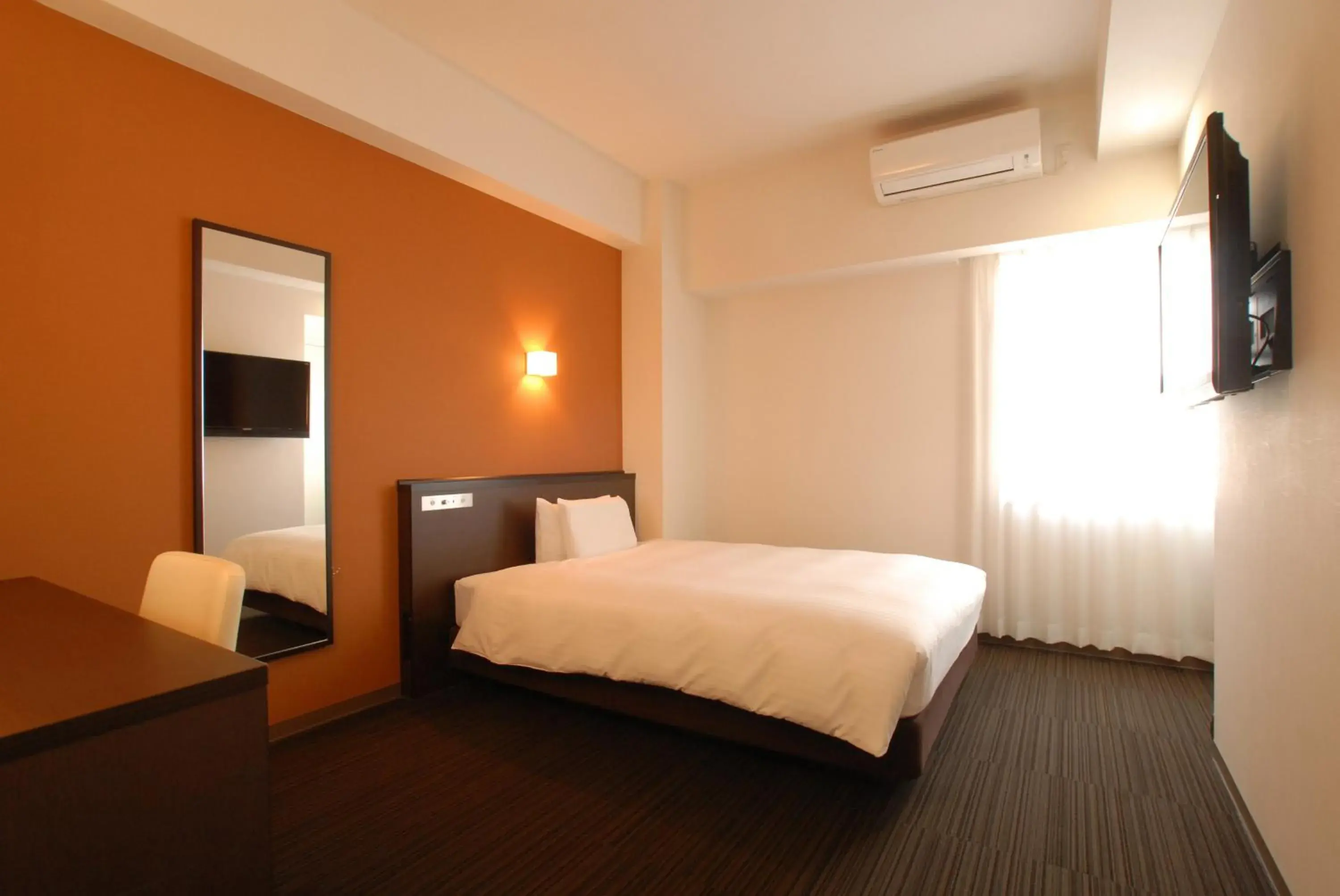 Bed in AB Hotel Komaki Bed in AB Hotel Komaki