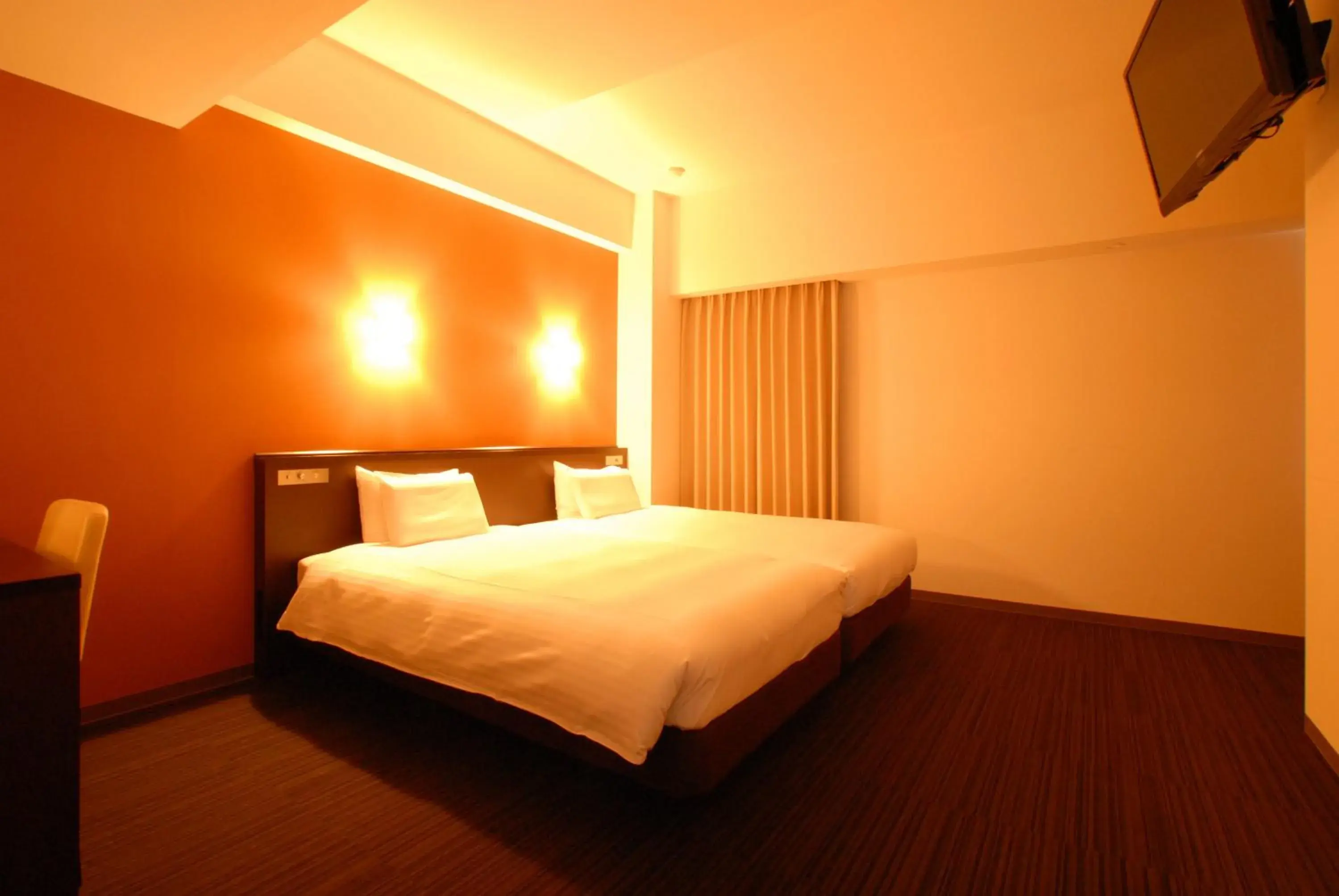 Bed in AB Hotel Komaki Bed in AB Hotel Komaki