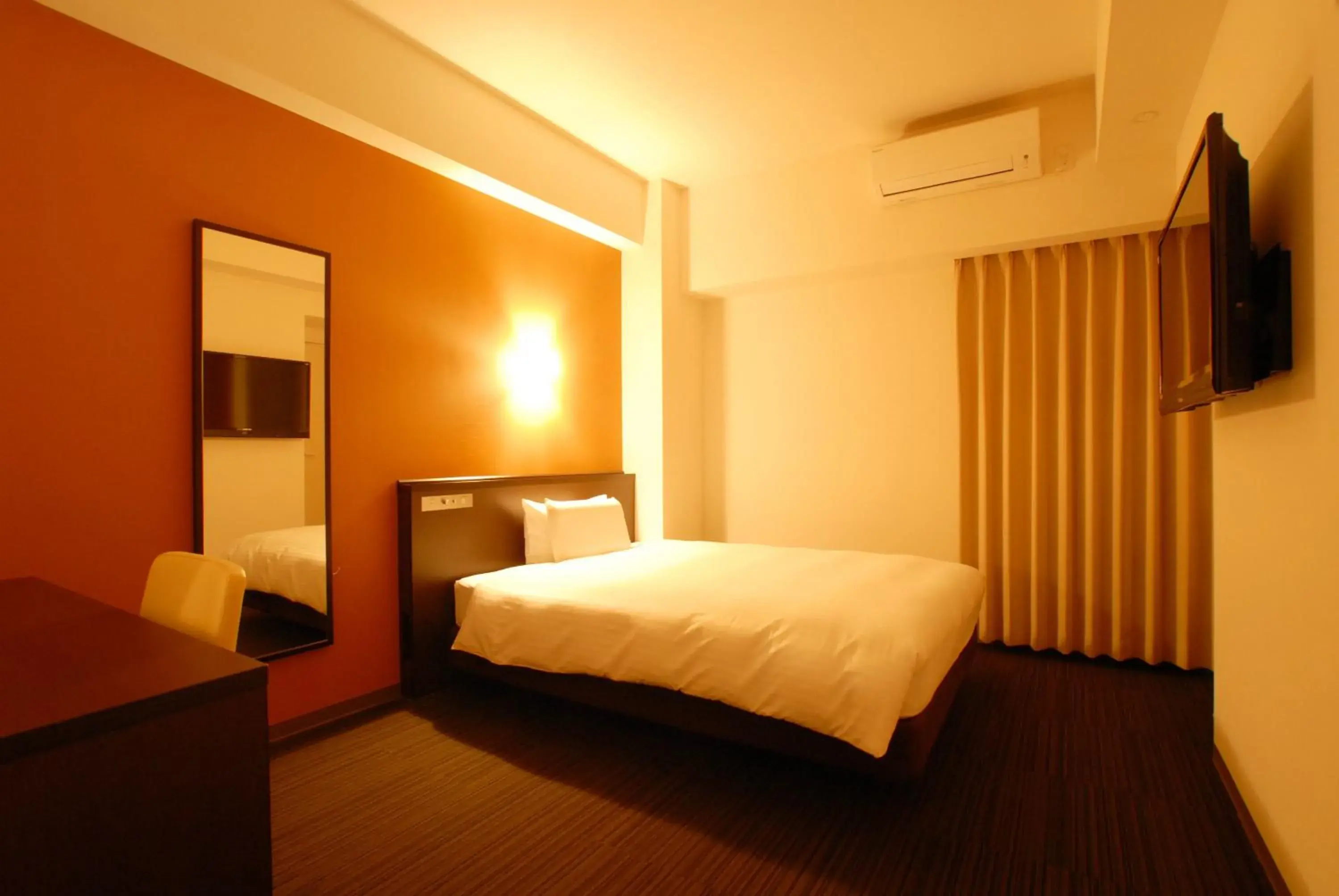 Bed in AB Hotel Komaki Bed in AB Hotel Komaki