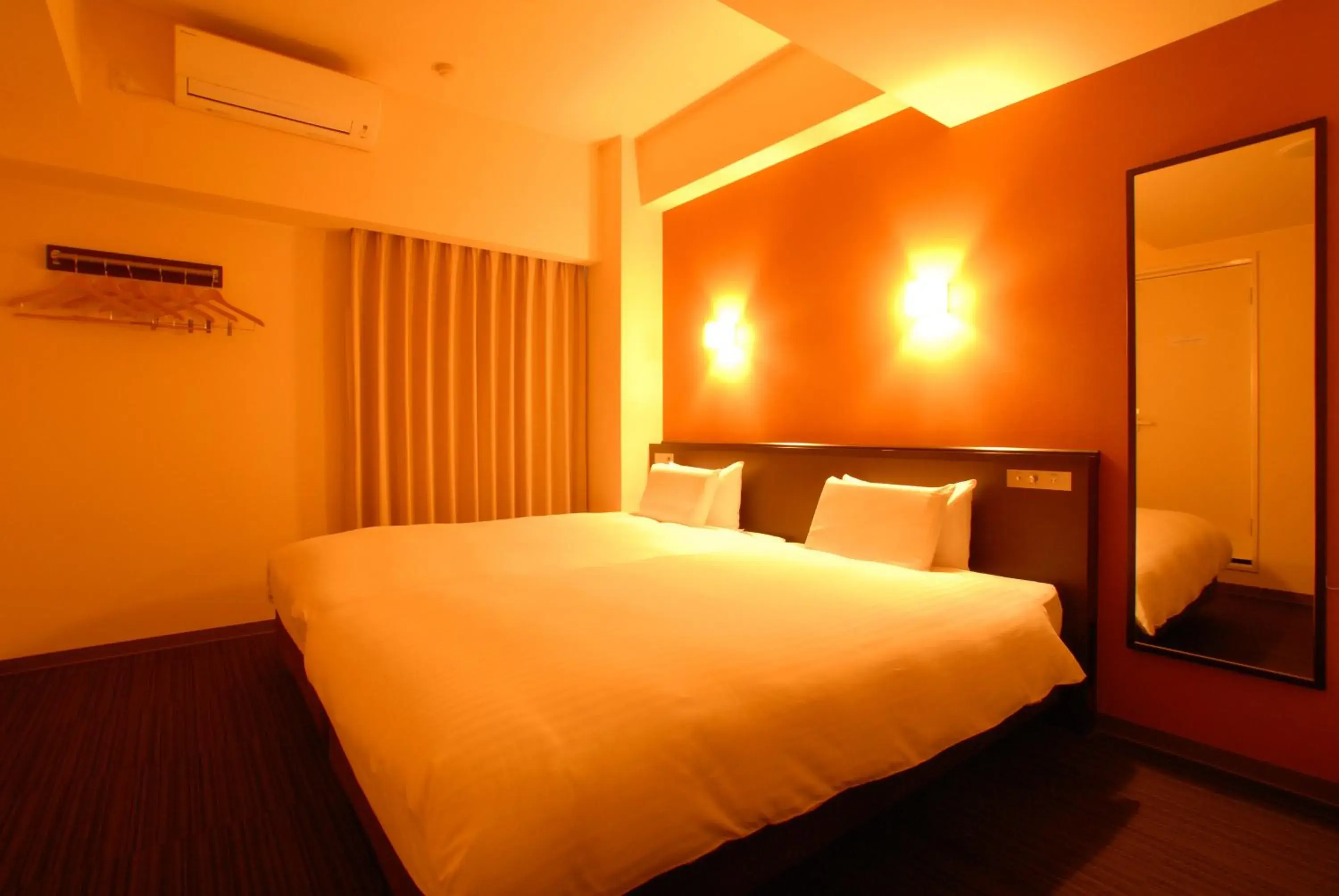 Bed in AB Hotel Komaki Bed in AB Hotel Komaki