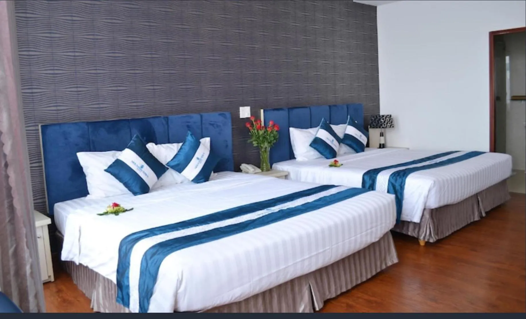 Photo of the whole room, Bed in Pho Nui Hotel