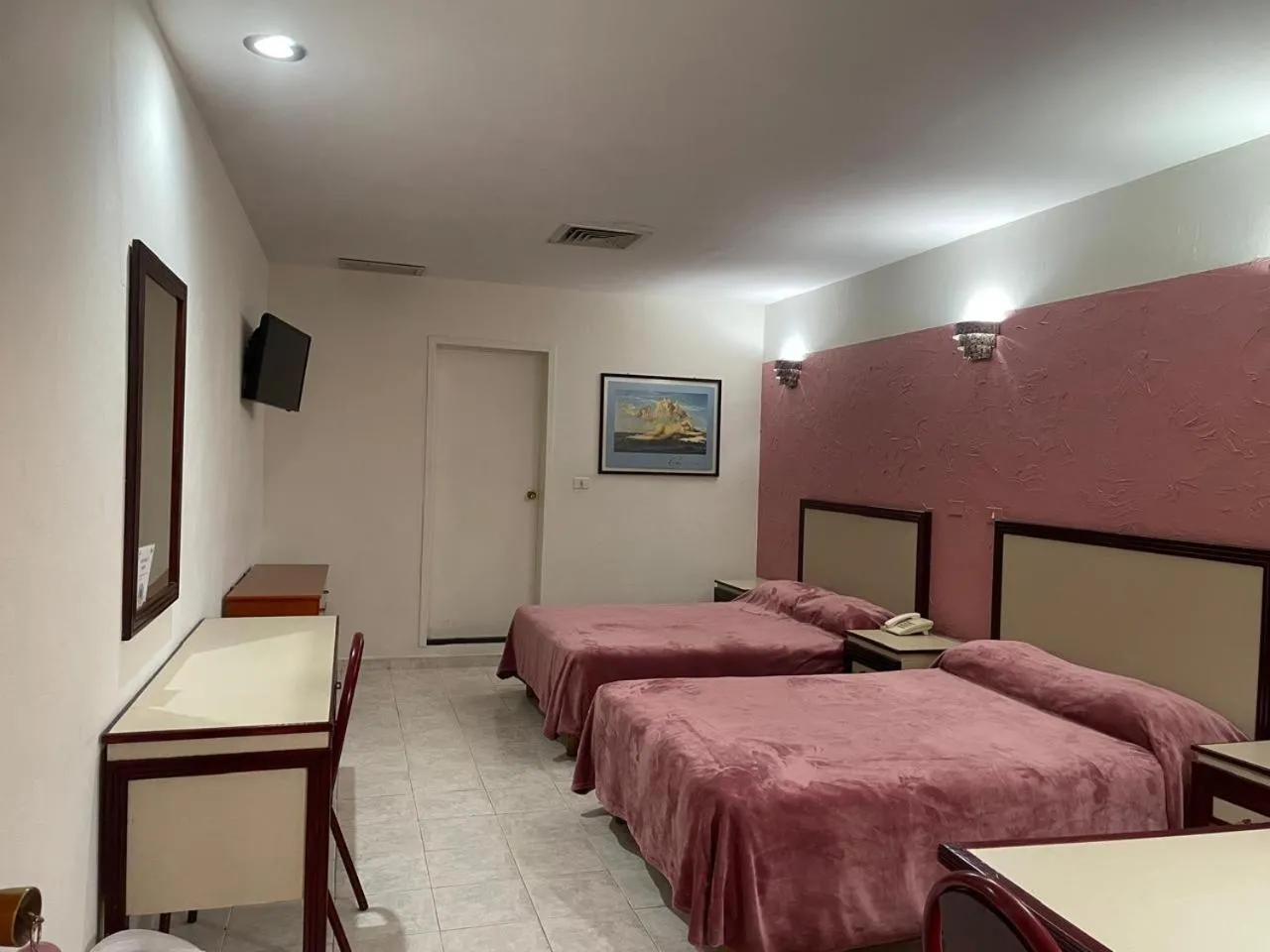 Bed in Hotel Tamazunchale