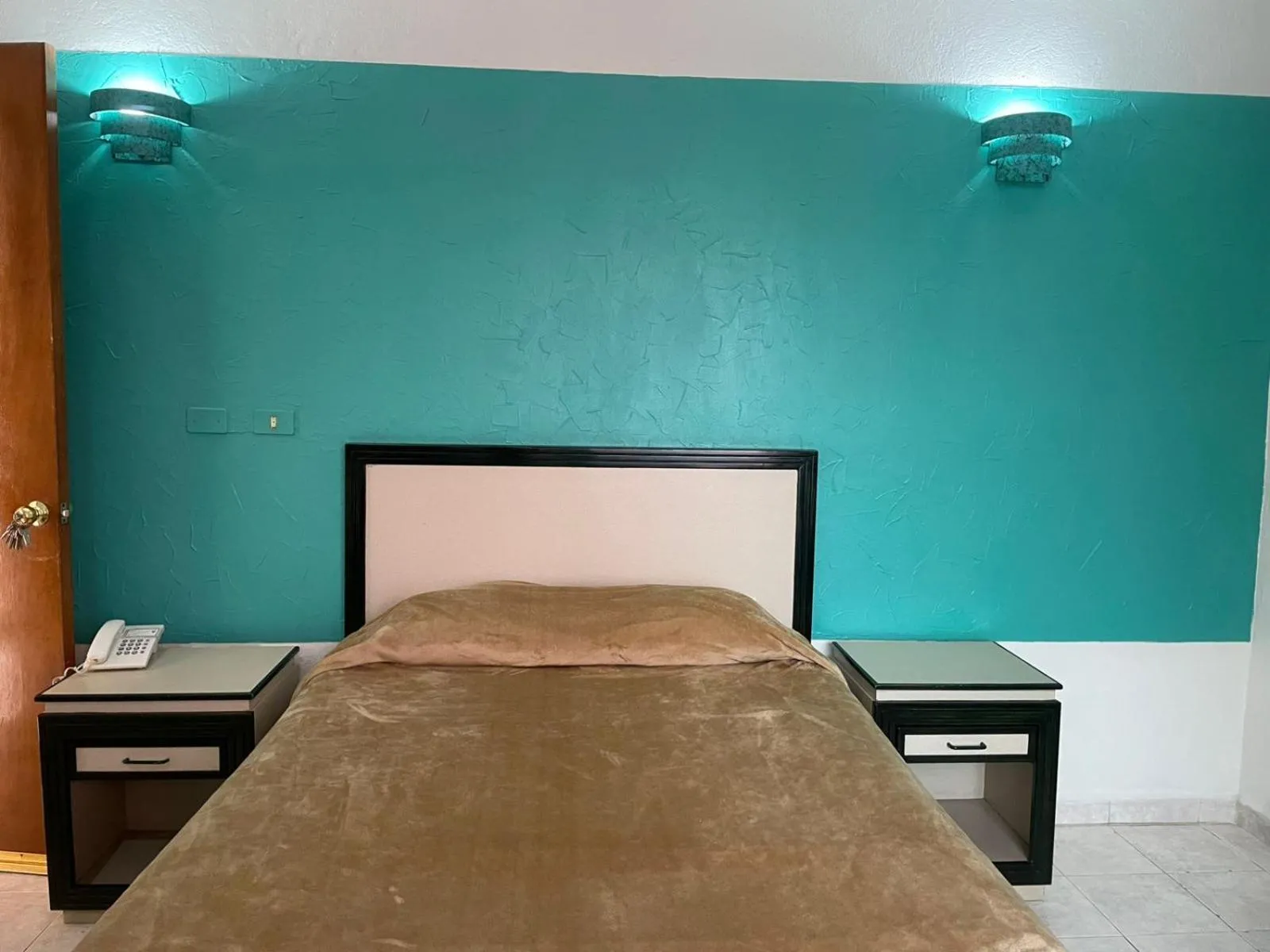 Bed in Hotel Tamazunchale