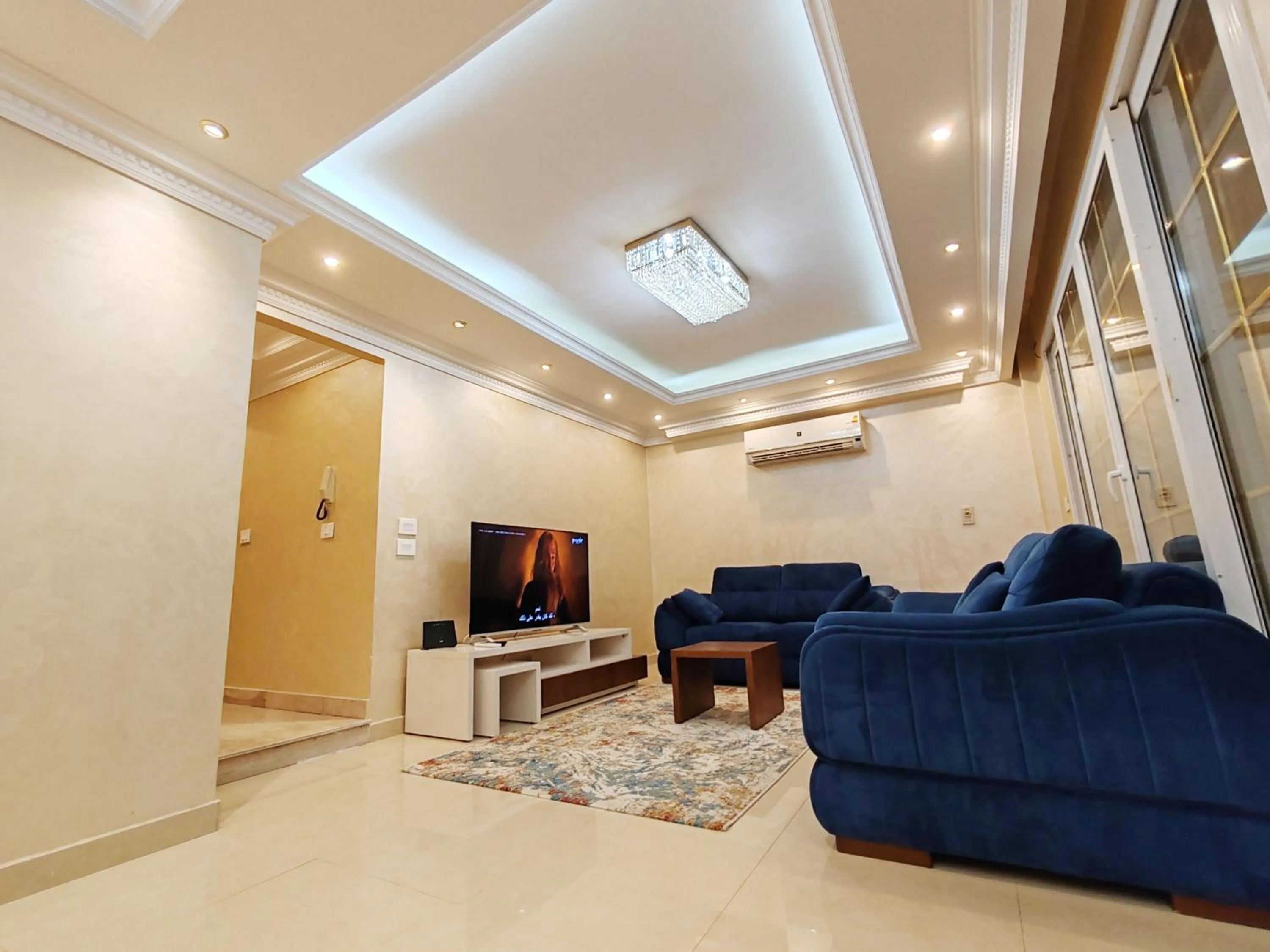 Communal lounge/ TV room in Furnished Flat In Rehab New Cairo