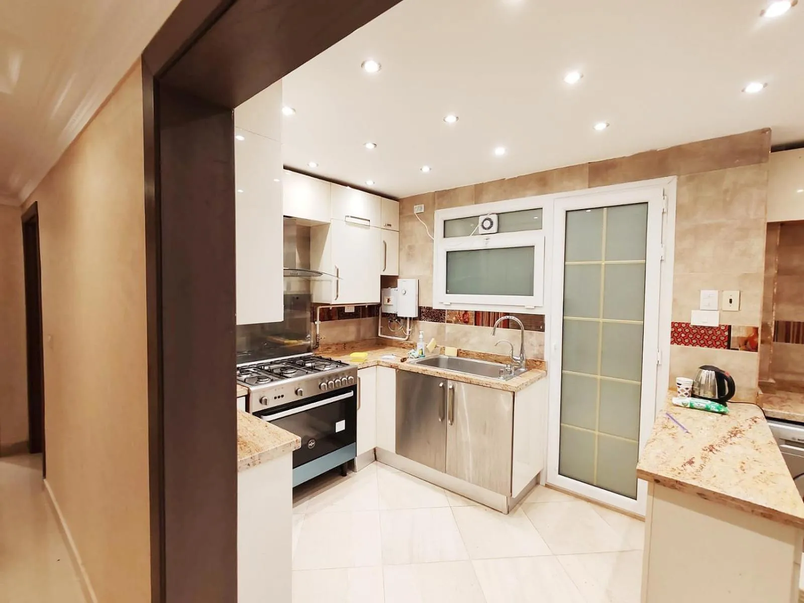 Kitchen or kitchenette in Furnished Flat In Rehab New Cairo