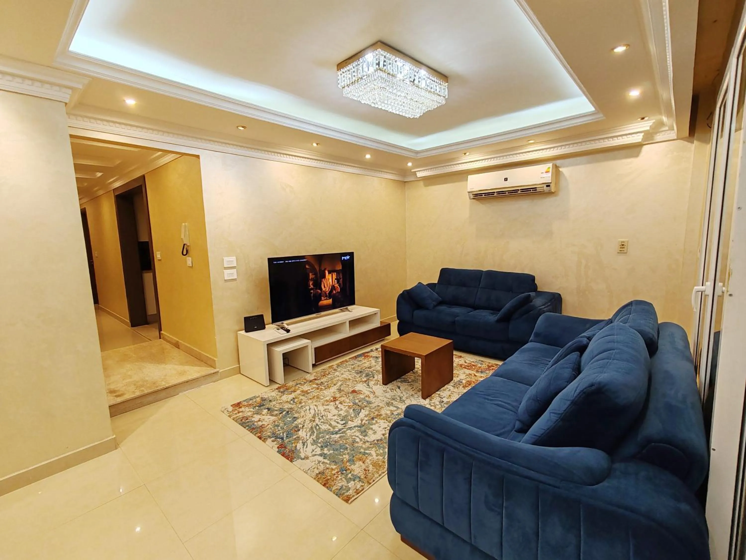 Communal lounge/ TV room in Furnished Flat In Rehab New Cairo
