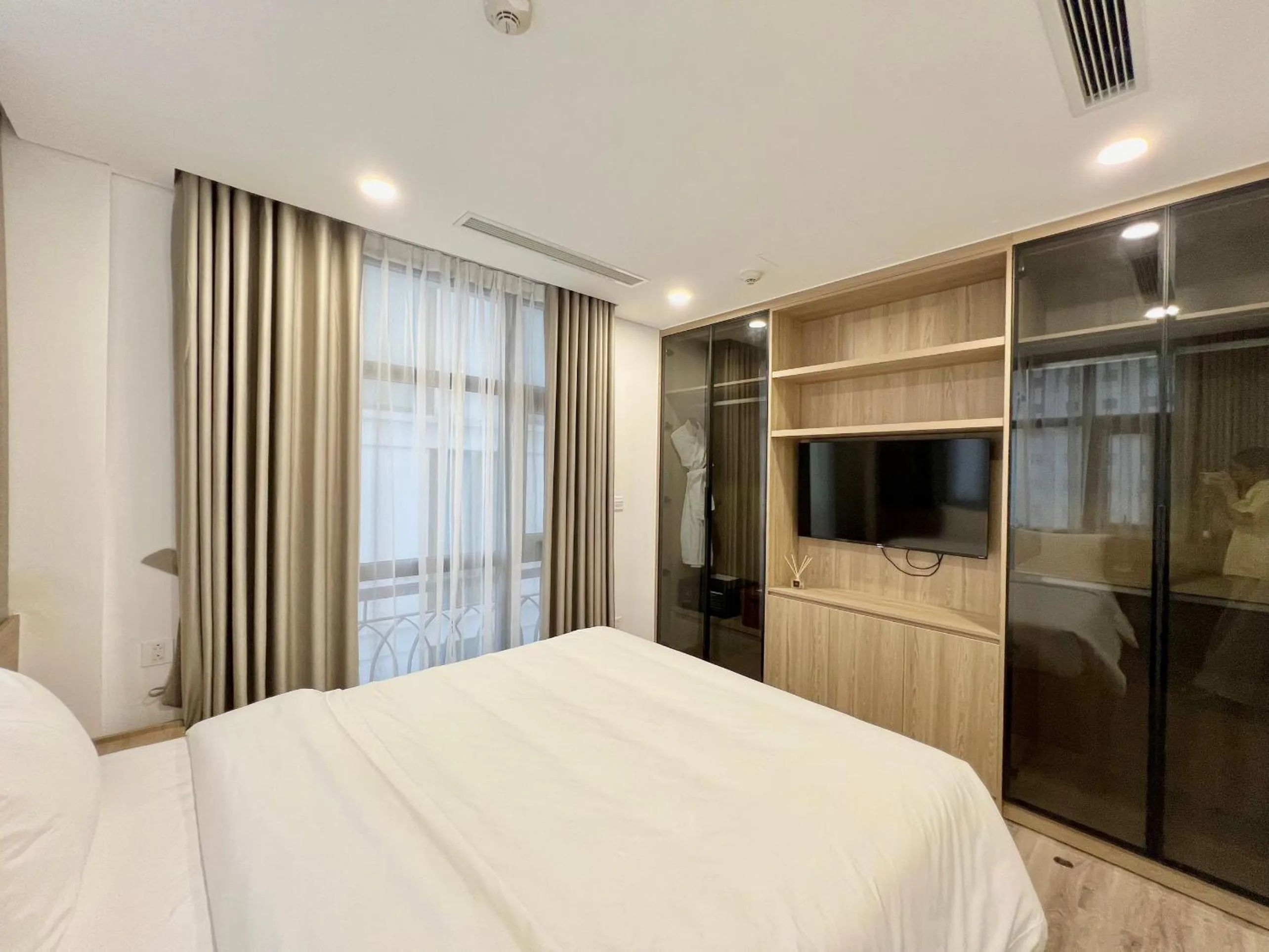 Bed in 22Land Legend Hotel & Residence