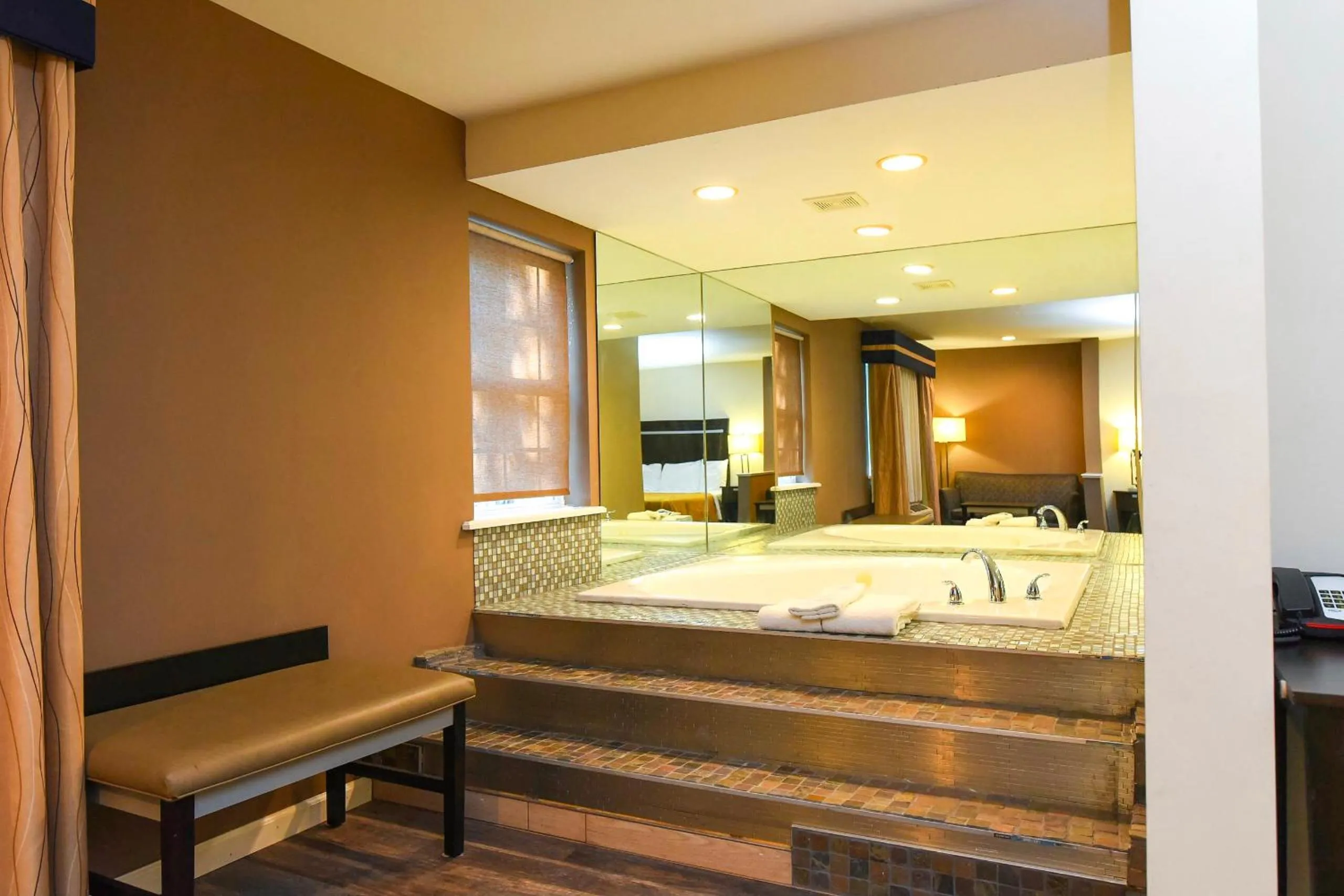 Bed in Capital Inn and Suites